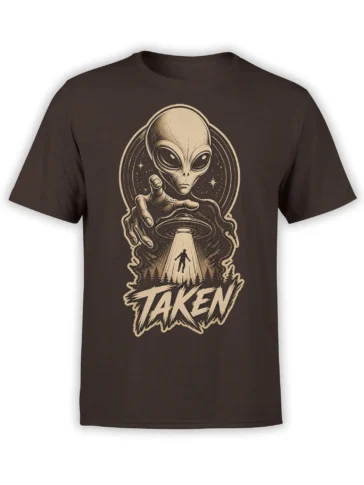 Brown alien abduction T-shirt with a large-eyed extraterrestrial, glowing saucer, forest scene, and “Taken” text
