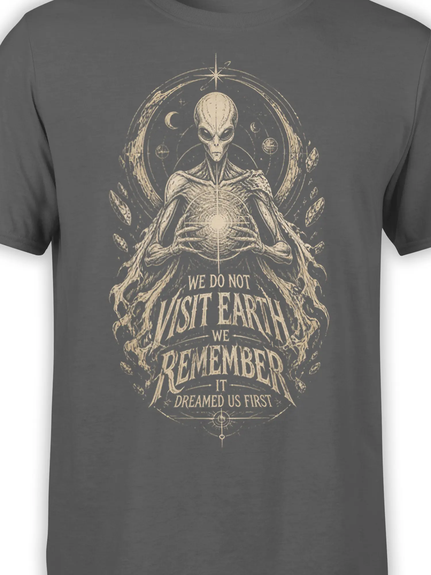 Close-up of the meditating extraterrestrial and celestial artwork printed in cream on a gray T-shirt