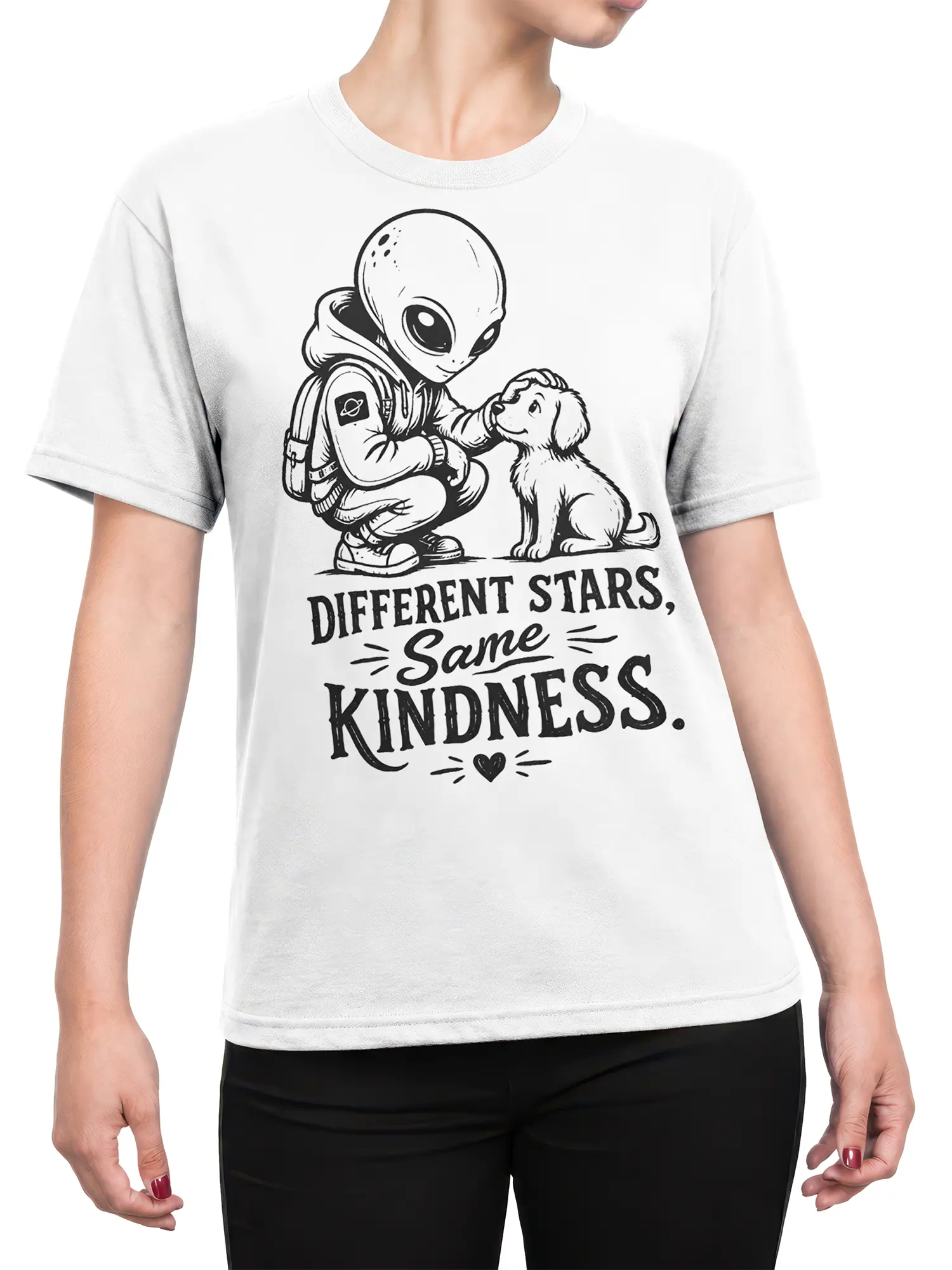 Female torso wearing a white alien and puppy kindness graphic T-shirt