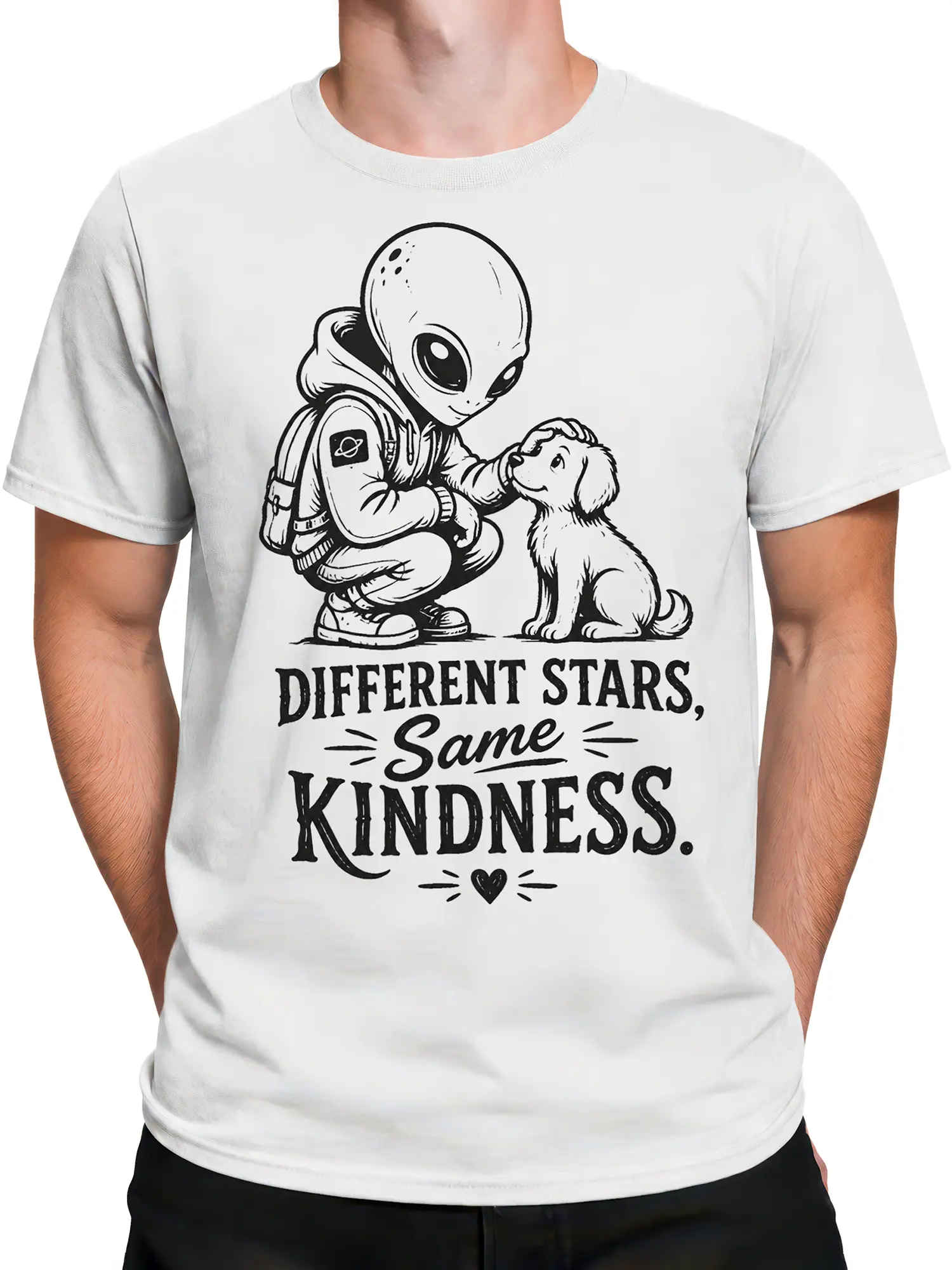 Male torso wearing a white alien and puppy kindness graphic T-shirt