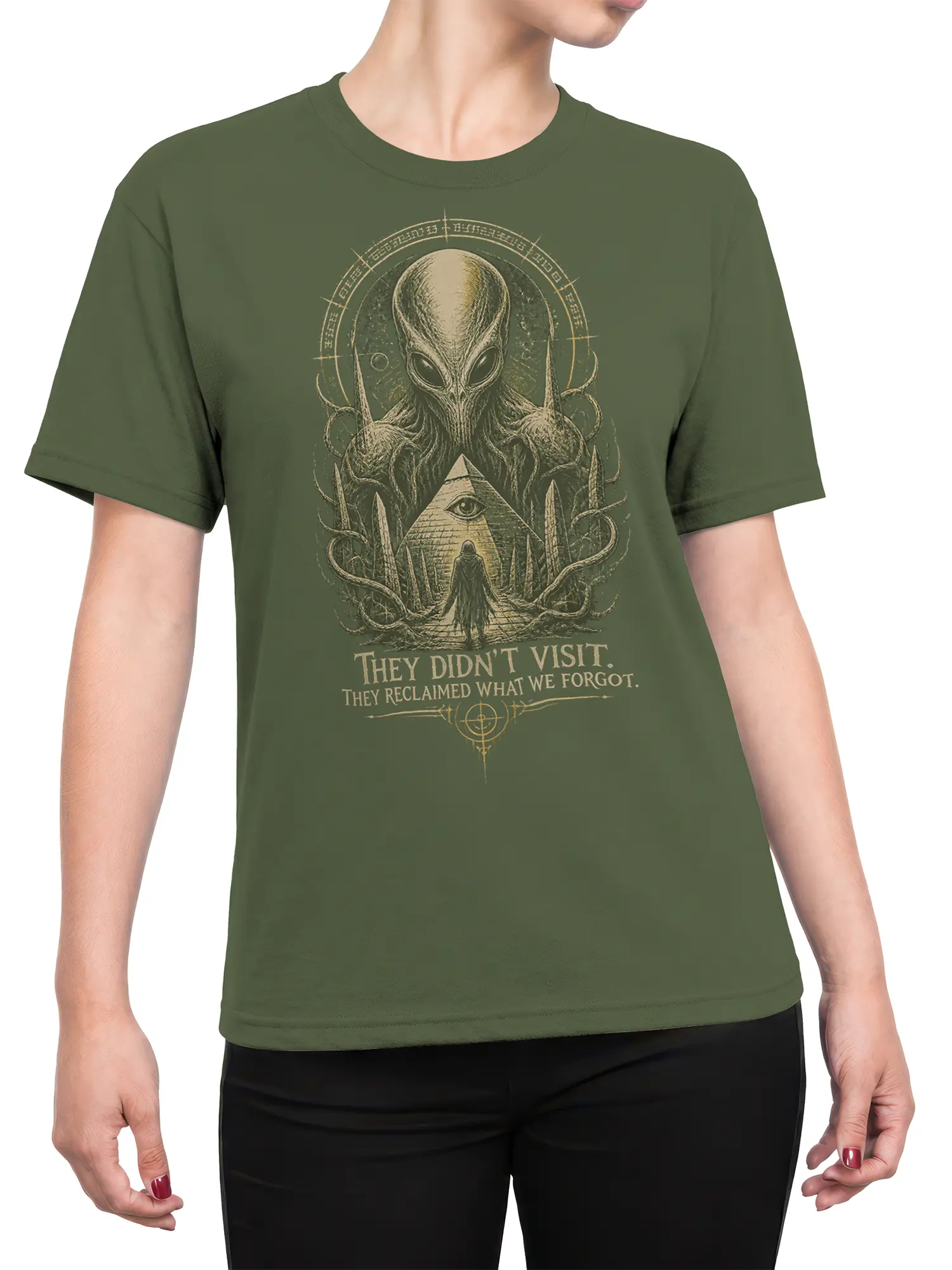Female torso wearing an olive green alien T-shirt with cosmic artwork, tentacles, pyramid eye, and hooded figure