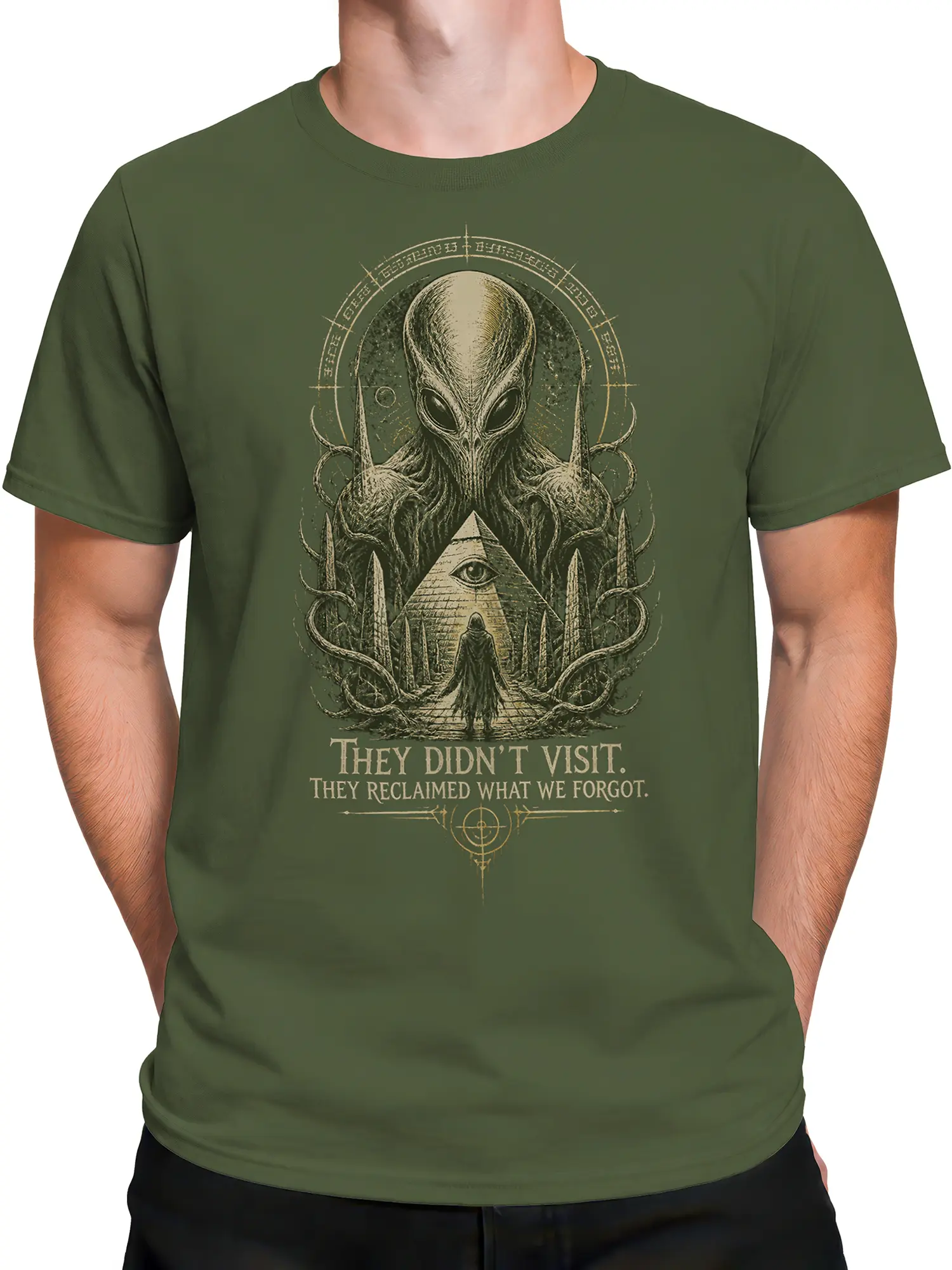 Male torso wearing an olive green alien T-shirt with mysterious pyramid eye, tentacles, and vintage cosmic artwork
