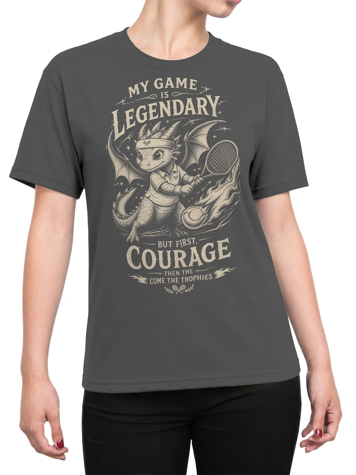 Female torso wearing a dark gray dragon tennis T-shirt with vintage fantasy sports artwork