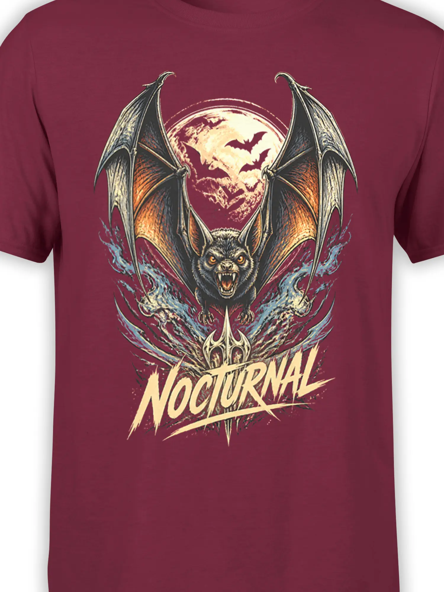 Close-up of fierce bat, full moon, flying bats, and NOCTURNAL lettering on burgundy fabric