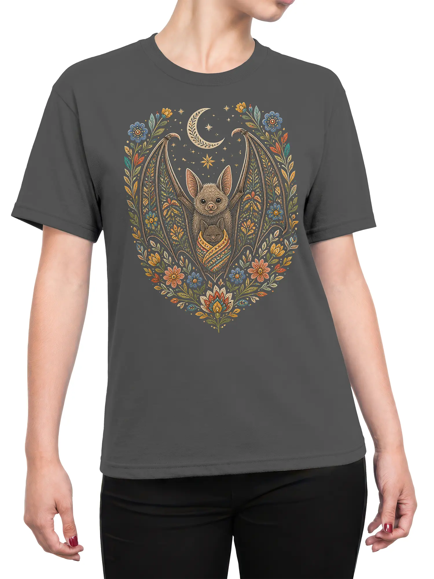 Female torso wearing a gray bat family T-shirt with a crescent moon, flowers, stars, and a baby bat design