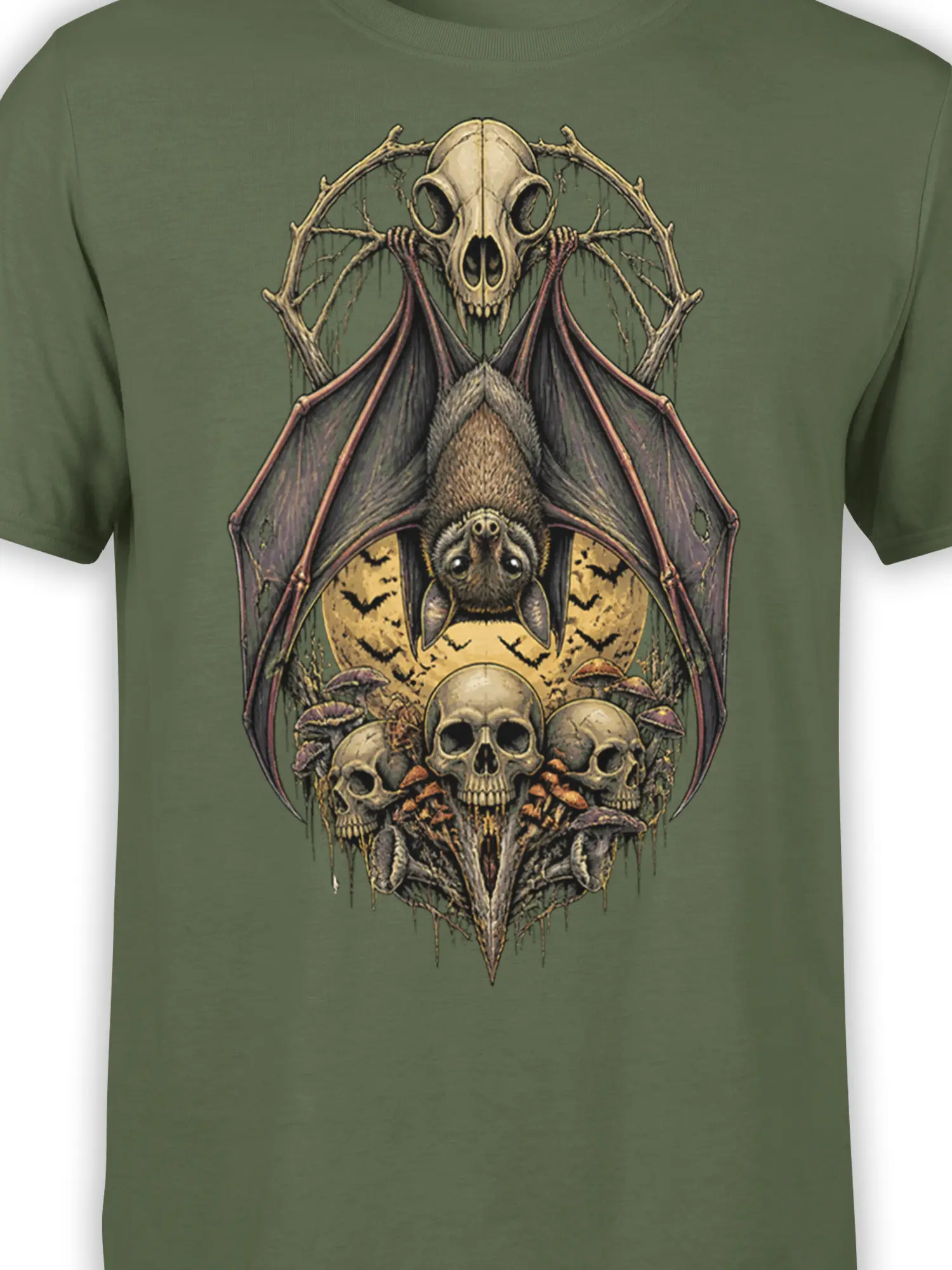 Close-up of gothic bat and skull artwork with mushrooms and thorny branches on an olive green T-shirt