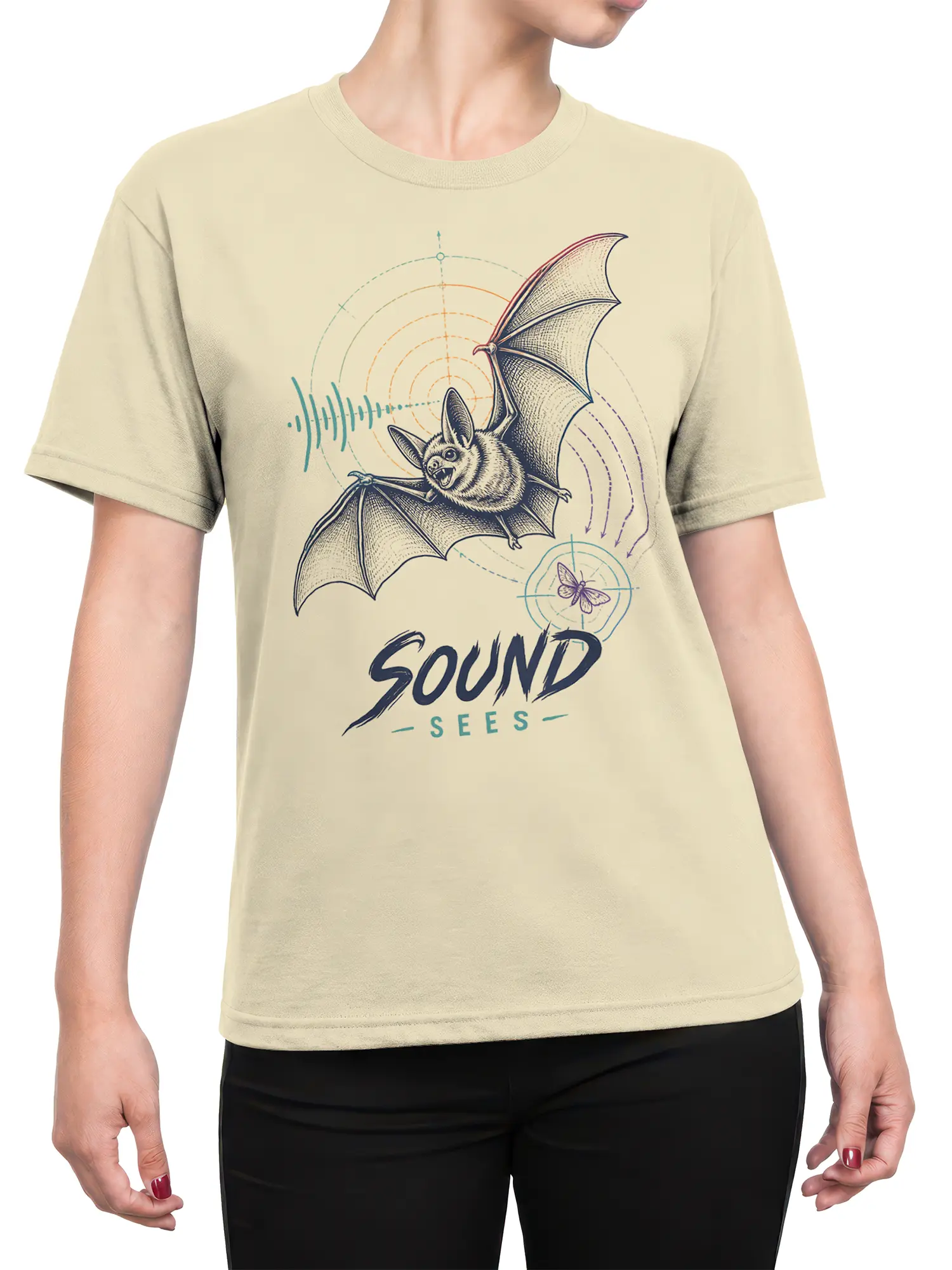 Female torso wearing a beige bat T-shirt with vintage sound-wave artwork and “SOUND SEES” lettering