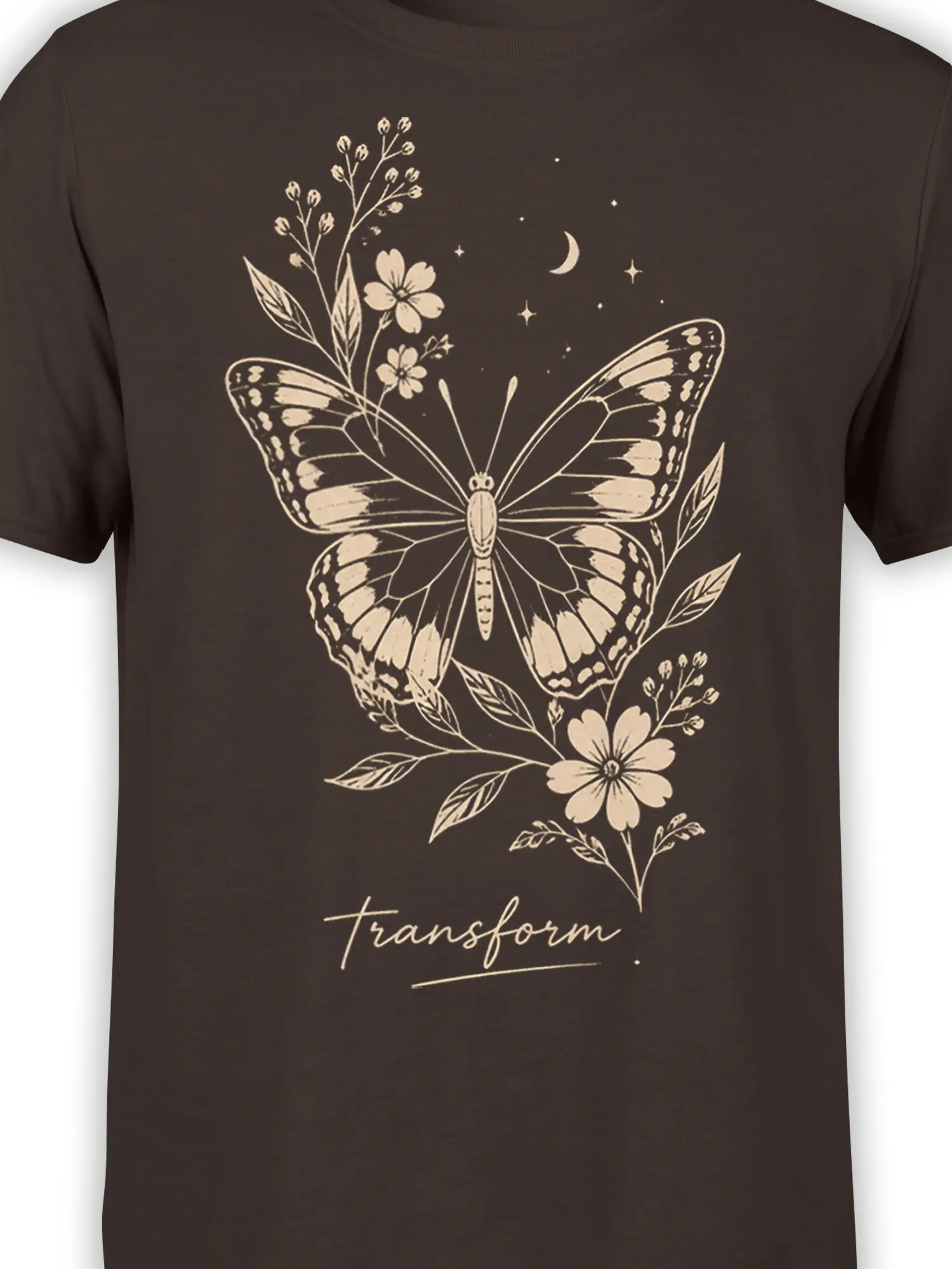 Close-up of cream butterfly wings, flowers, stars, and transform lettering on a brown T-shirt