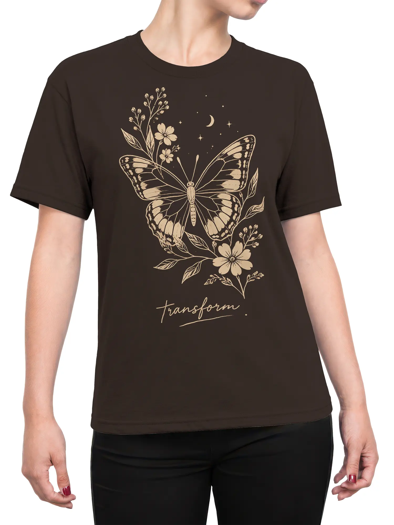 Female torso wearing a brown butterfly T-shirt with flowers, moon, stars, and transform lettering