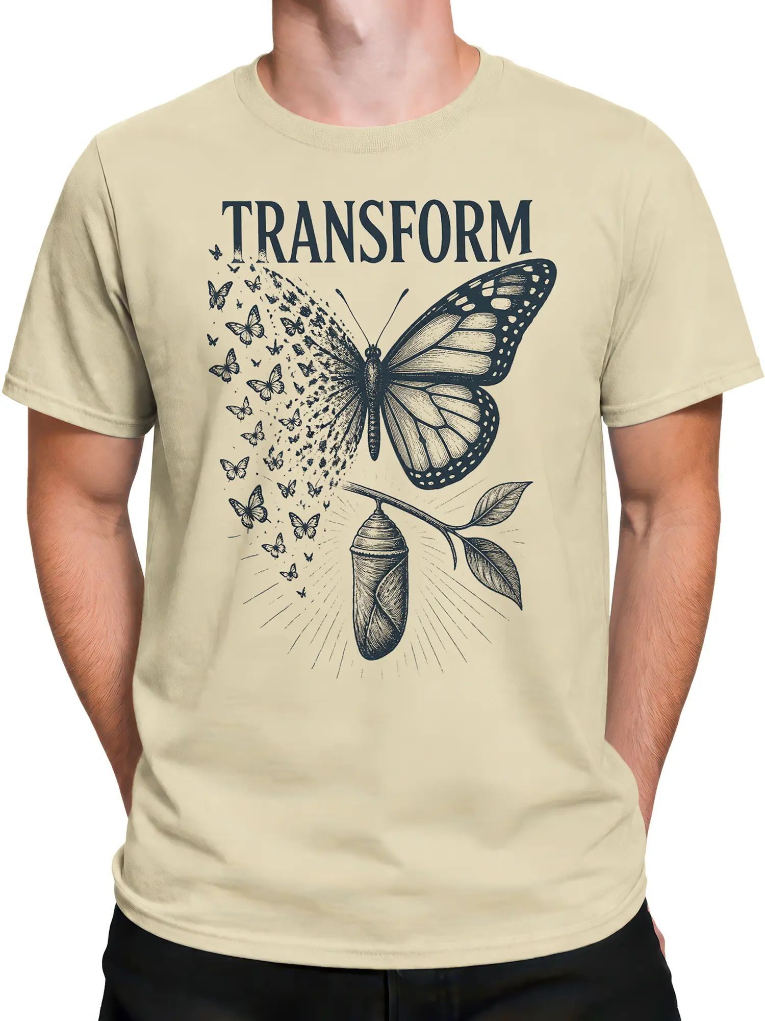 Male torso wearing a beige butterfly transformation T-shirt with deep blue chrysalis and wing artwork