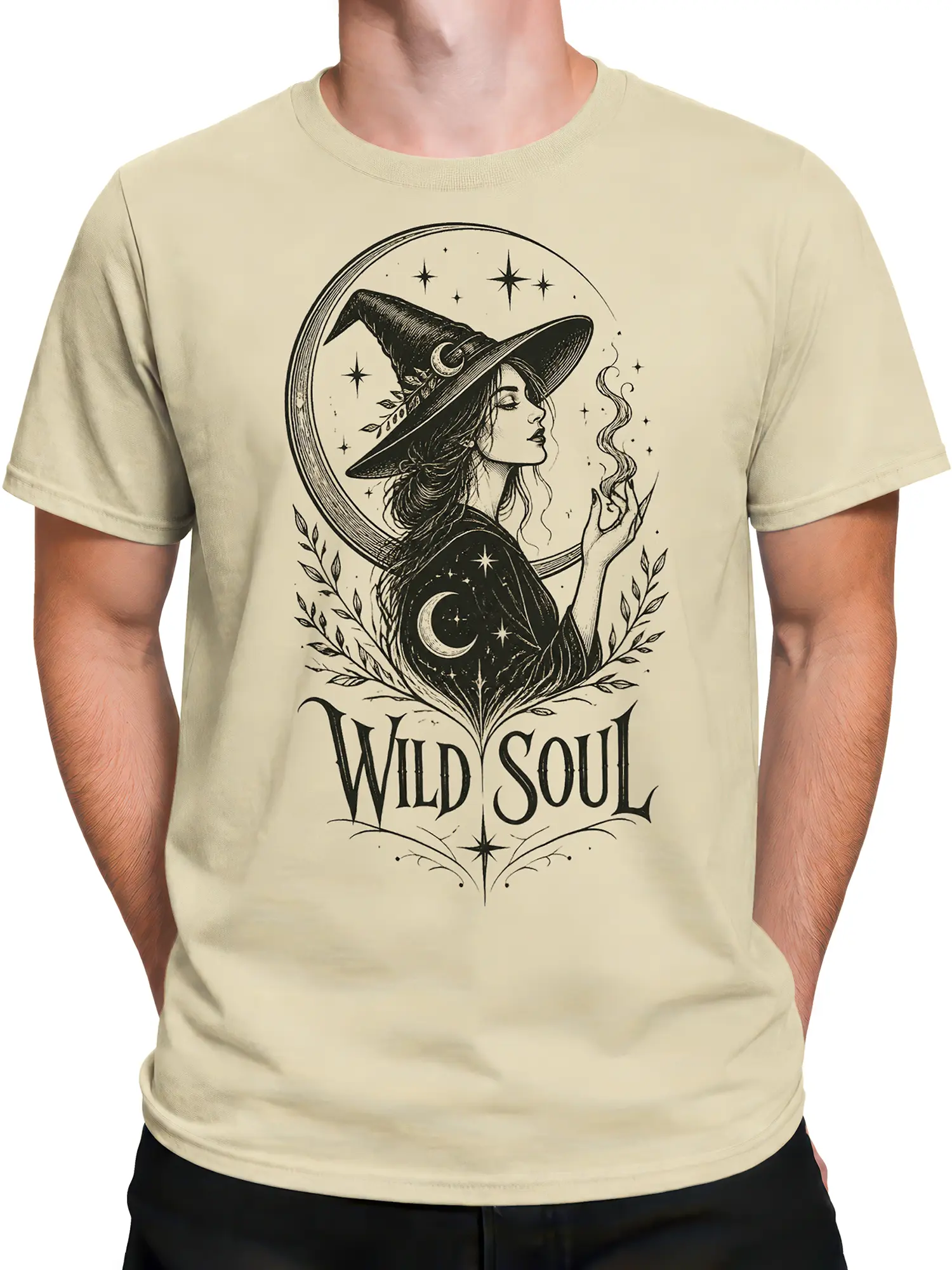 Male torso wearing a beige Wild Soul witch T-shirt with vintage fantasy witch artwork