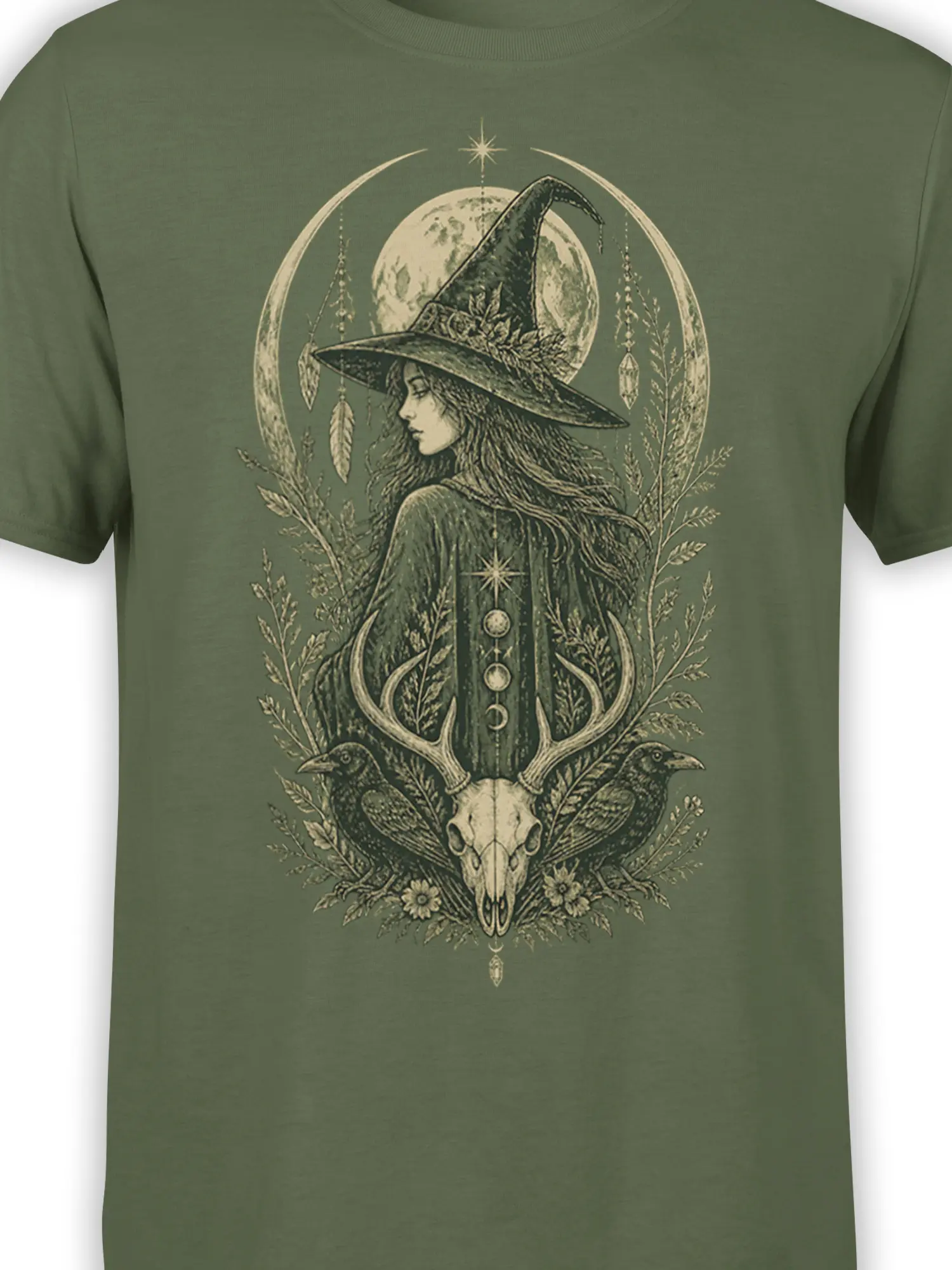Close-up of the witch, moon, ravens, deer skull, and antler artwork printed on an olive green T-shirt