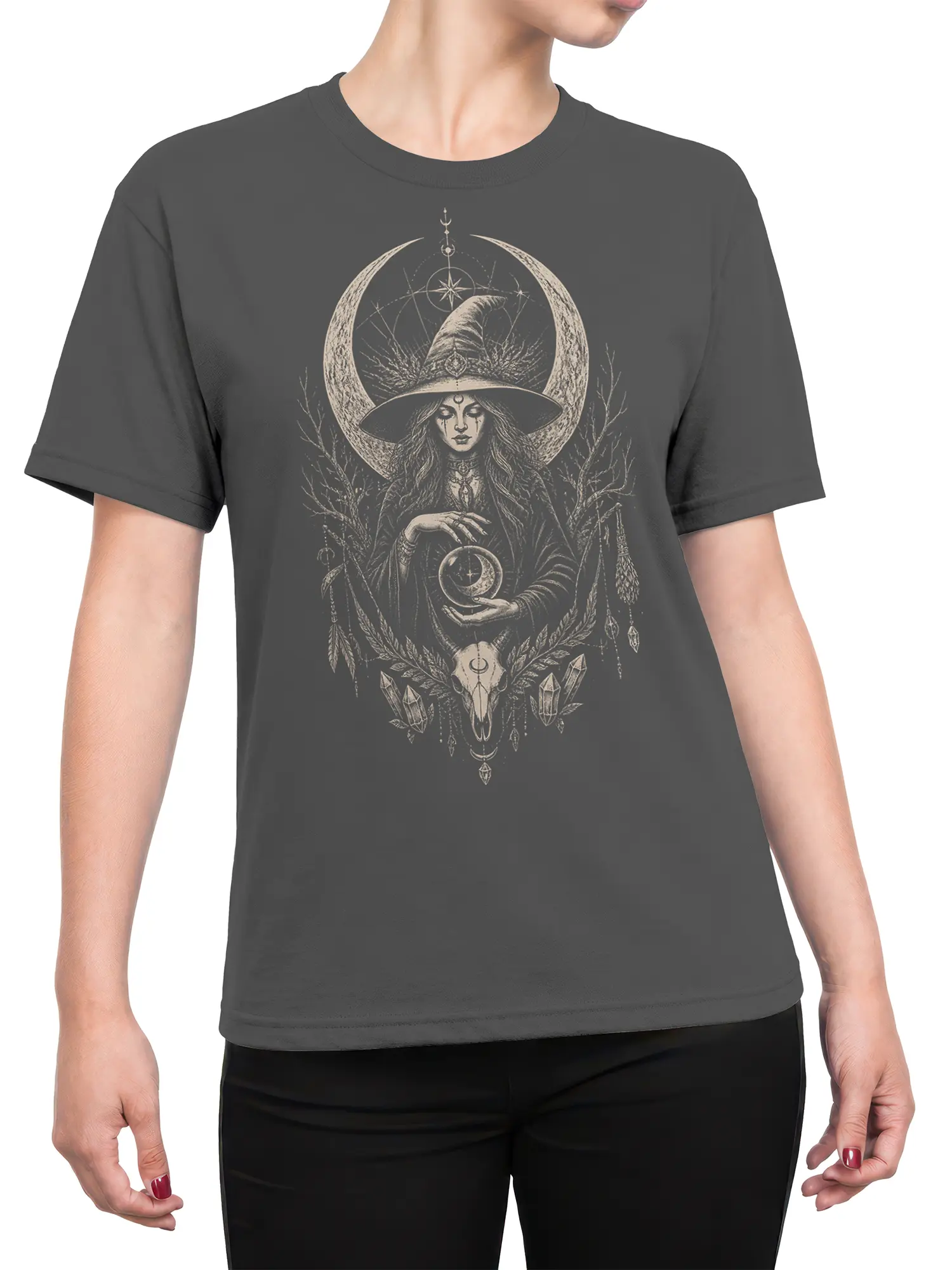Female torso wearing a gray witch T-shirt with crescent moon, crystal ball, and mystical celestial artwork