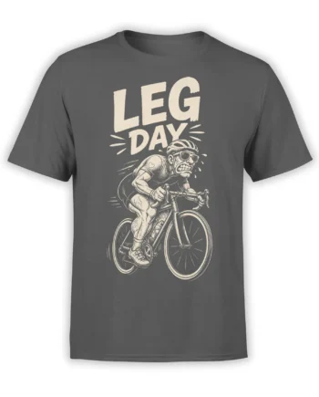 Gray cycling T-shirt with muscular cyclist riding a road bike beneath bold cream LEG DAY lettering