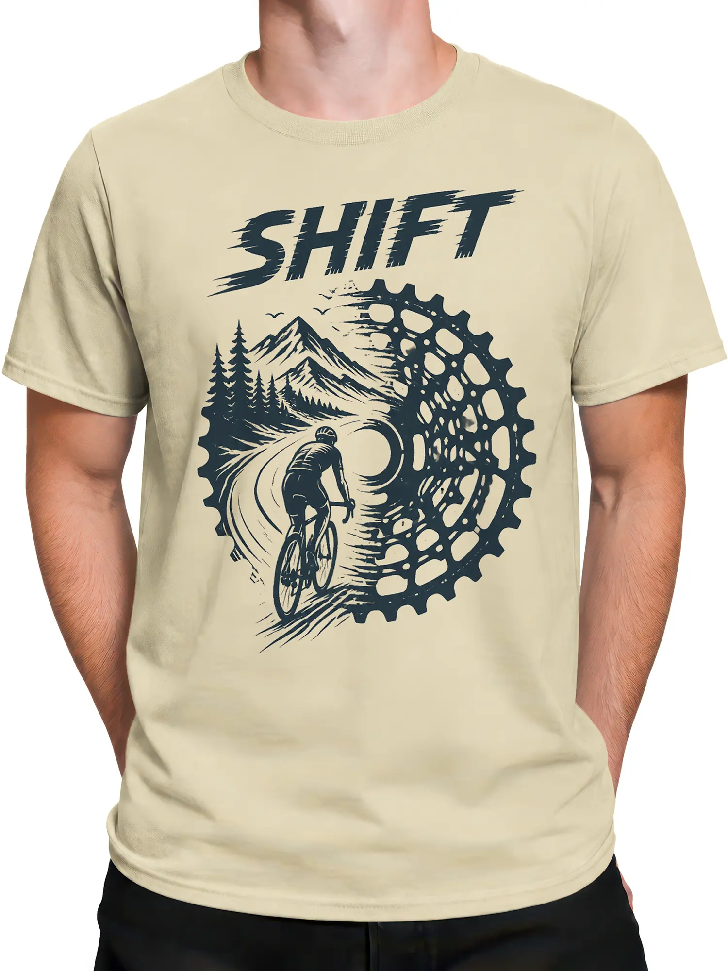 Male torso wearing a beige cycling T-shirt with a mountain rider and mechanical gear graphic
