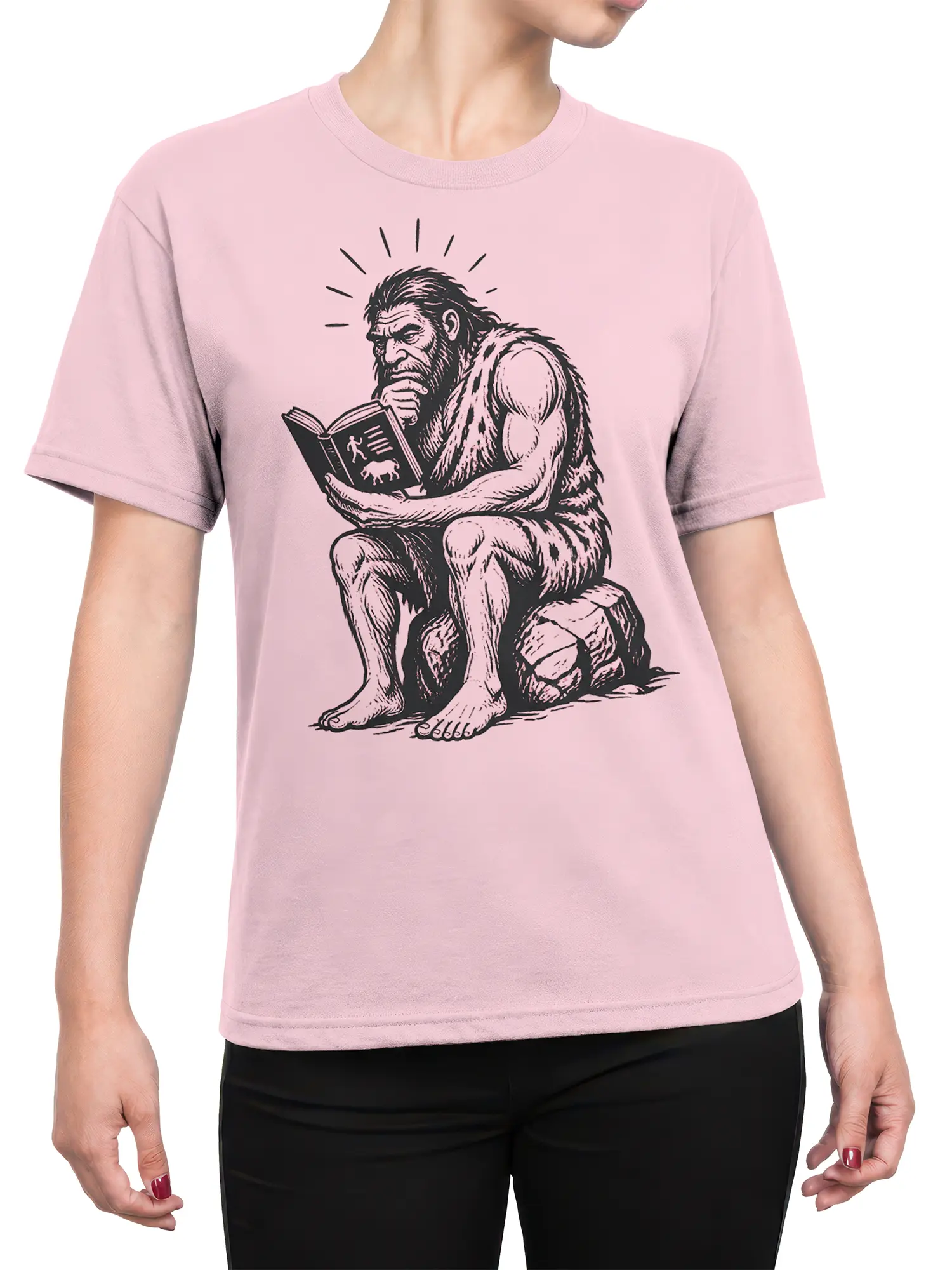 Female torso wearing a pink T-shirt with a thoughtful caveman reading an open book