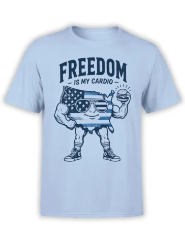 Light blue patriotic T-shirt with a muscular American flag character, burger, sunglasses, and Freedom Is My Cardio text