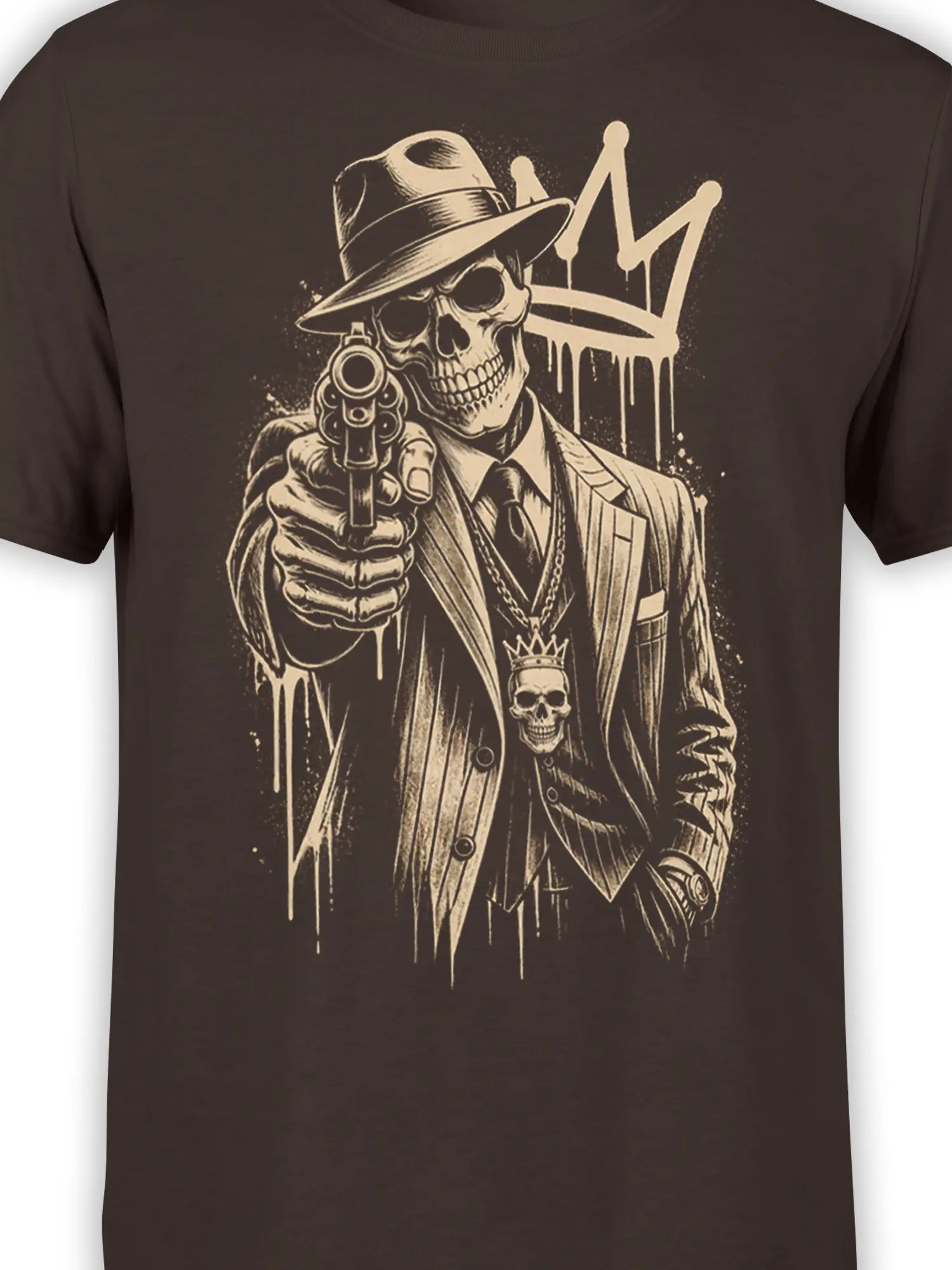 Close-up of the suited skeleton, fedora, revolver, chains, and crown on a dark brown T-shirt