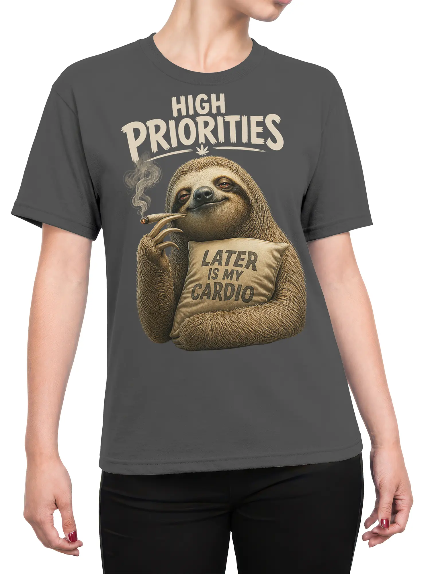 Female torso wearing a charcoal gray sloth T-shirt with relaxed “High Priorities” artwork and pillow slogan