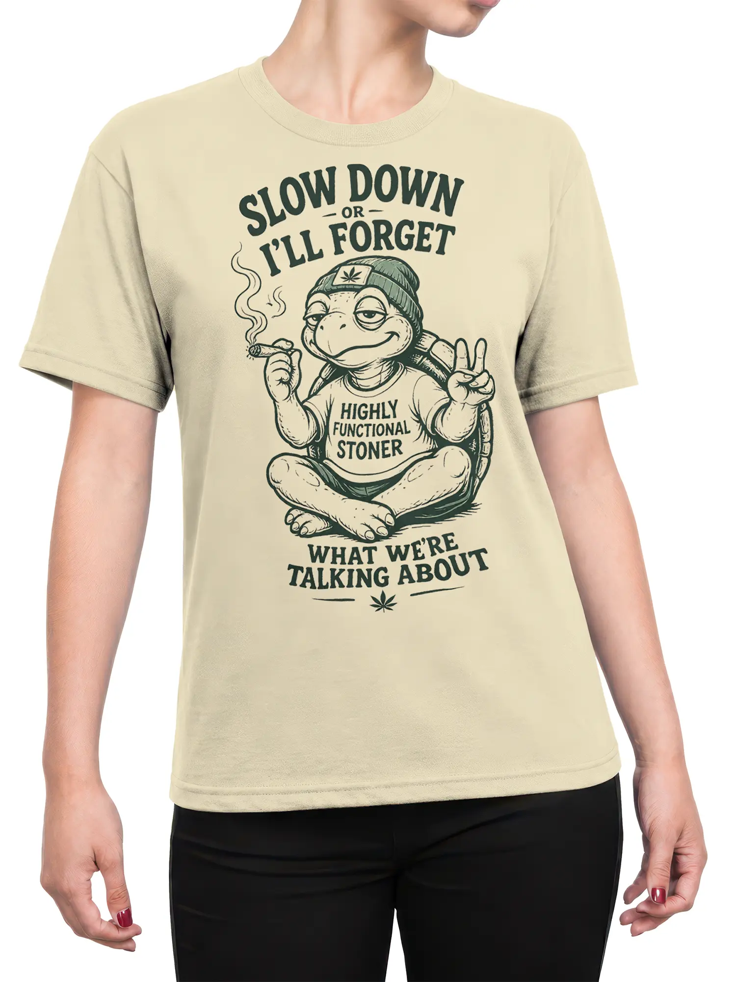 Female torso wearing a cream turtle stoner T-shirt with vintage lettering and a relaxed cannabis-inspired graphic