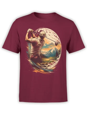 Vintage golfer swinging across a giant golf ball with mountains and a sunset landscape on a burgundy shirt