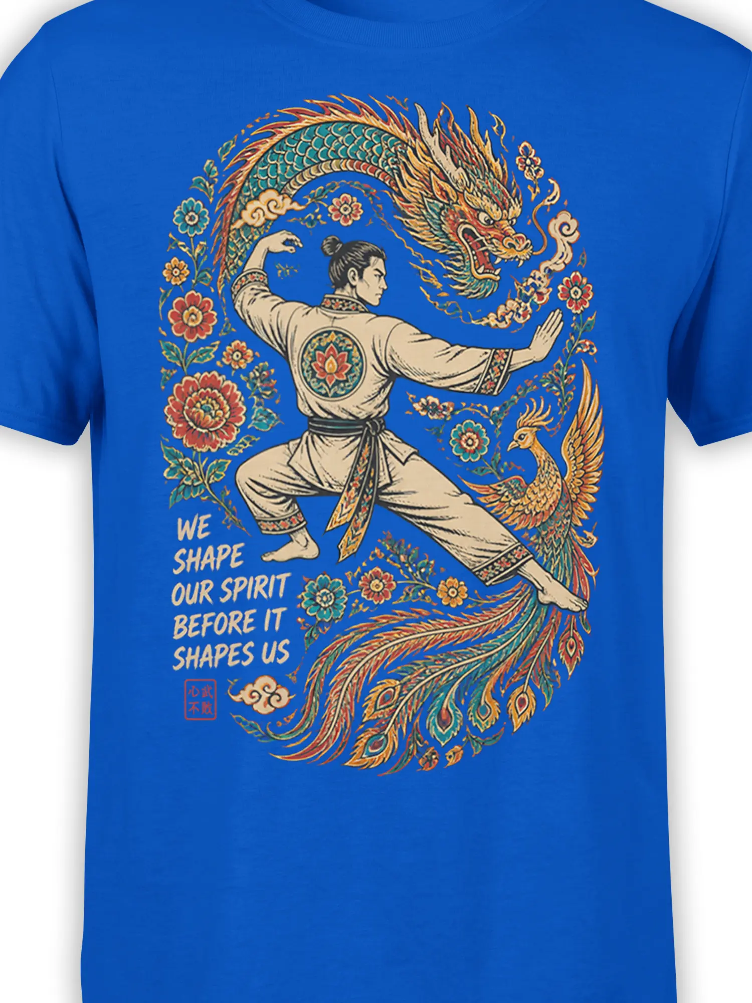 Close-up of dragon, martial artist, phoenix, flowers, and spirit quote on a blue graphic T-shirt