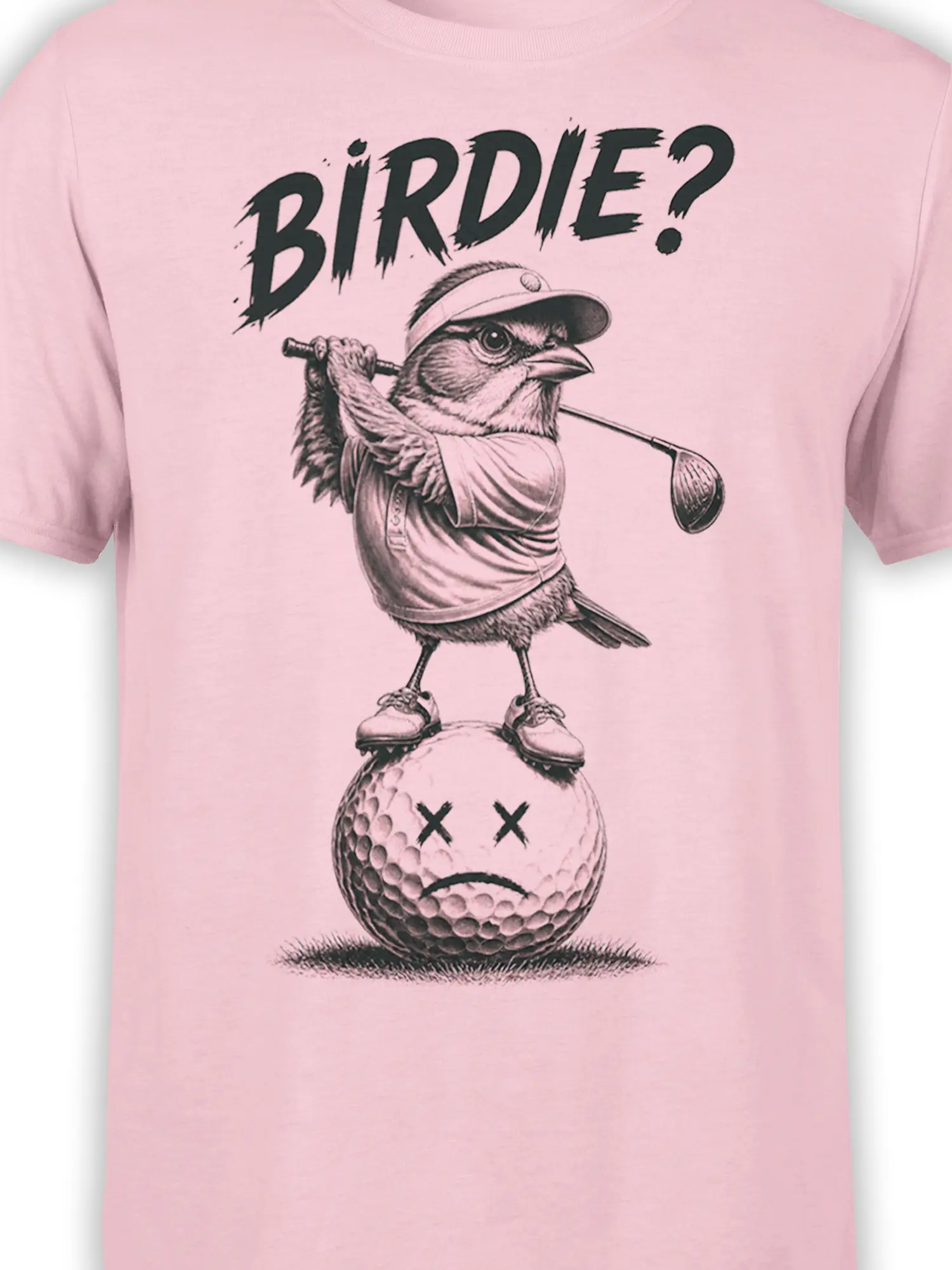 Close-up of the bird golfer, golf club, defeated golf ball, and “BIRDIE?” design on a light pink shirt