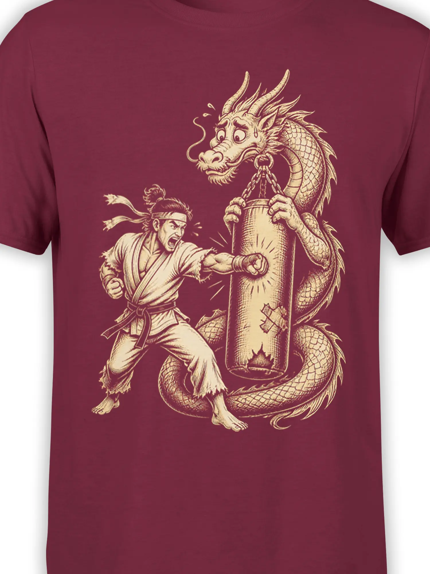 Close-up of martial artist and horned dragon artwork printed in cream on a burgundy T-shirt