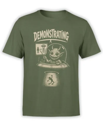 Green alien abduction T-shirt with horned extraterrestrial, flying saucer, human diagram, and “Demonstrating” text