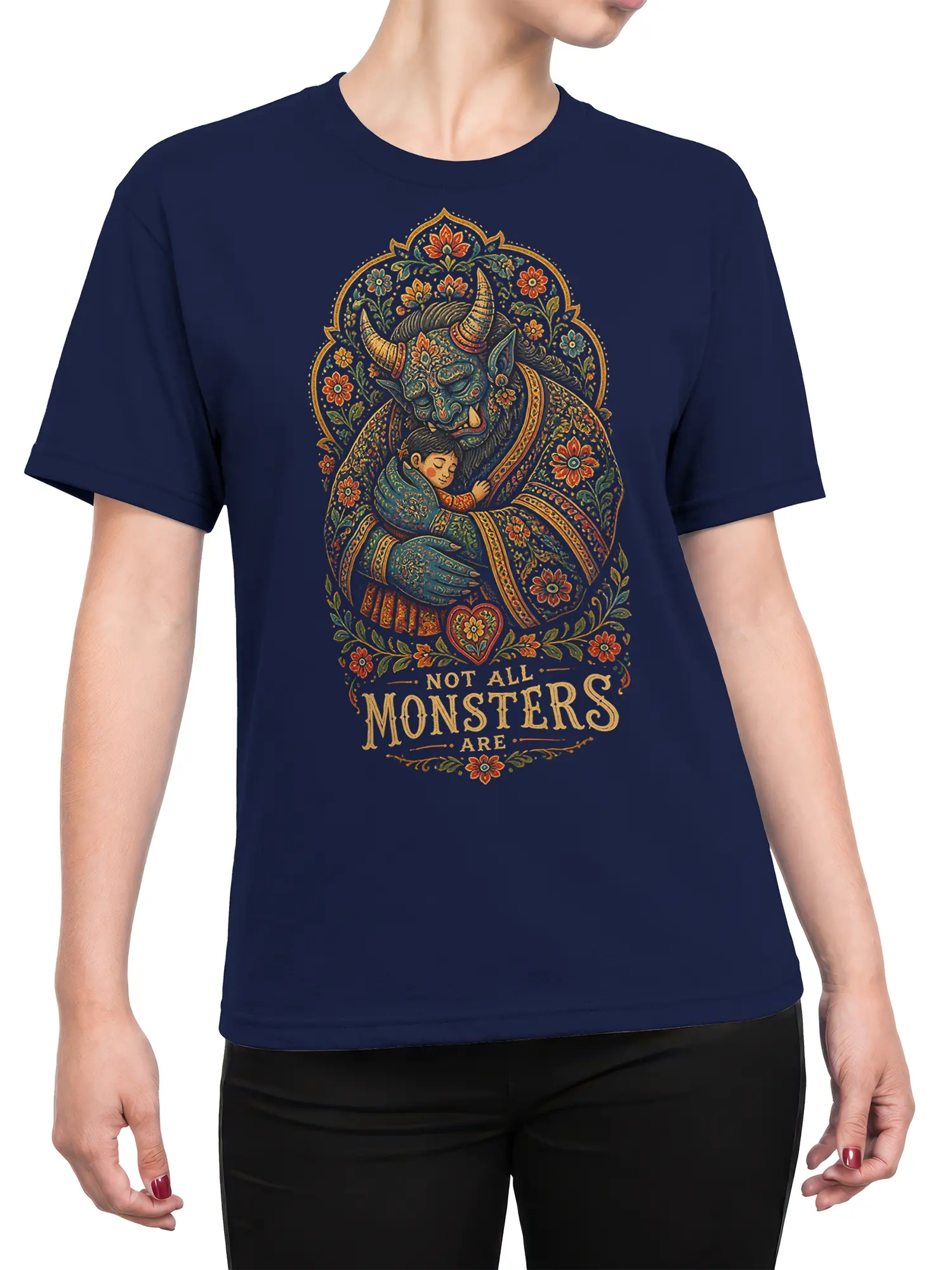 Female torso wearing a navy monster T-shirt with a tender horned creature and sleeping child graphic