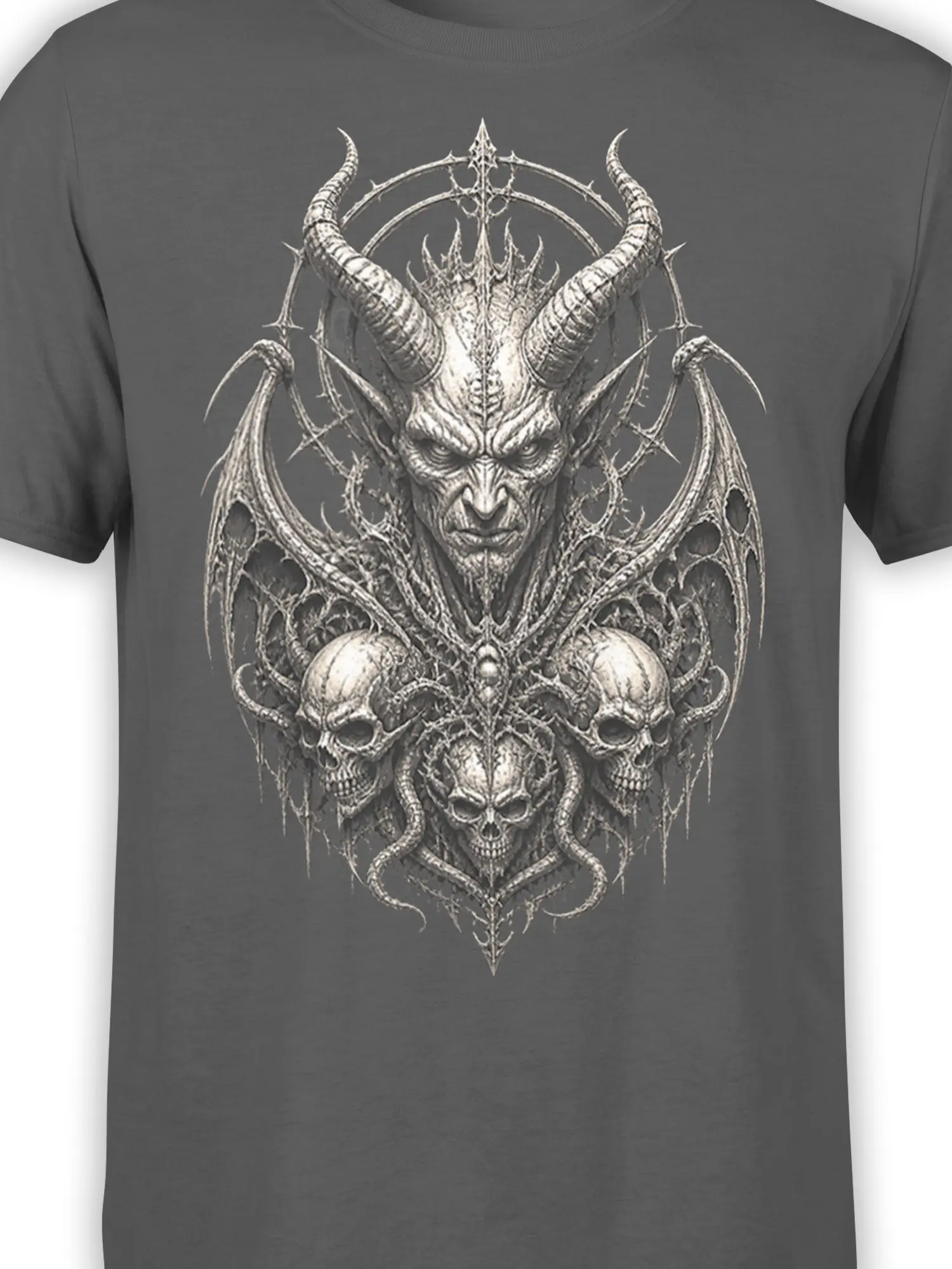Close-up of horned demon face, curved horns, wing details, and skull artwork on gray fabric