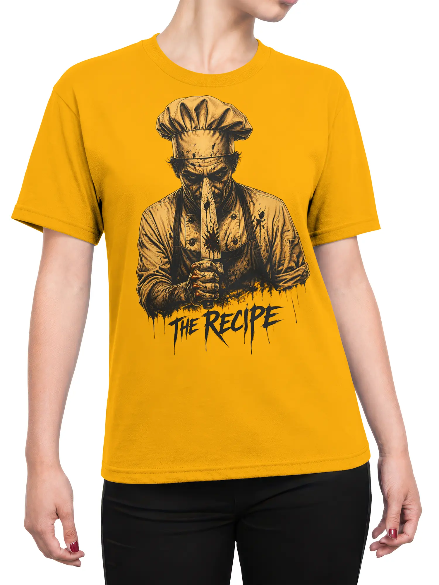 Female torso wearing a yellow T-shirt with sinister masked chef and “The Recipe” artwork