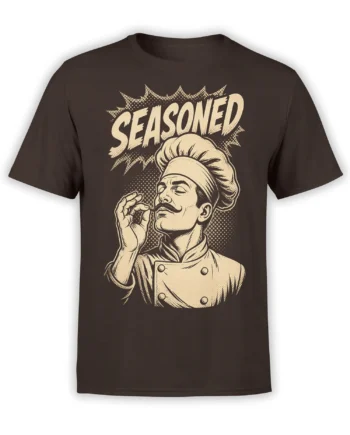 Brown T-shirt with a vintage mustached chef illustration, tall hat, cream “SEASONED” lettering, and comic-style halftone shading
