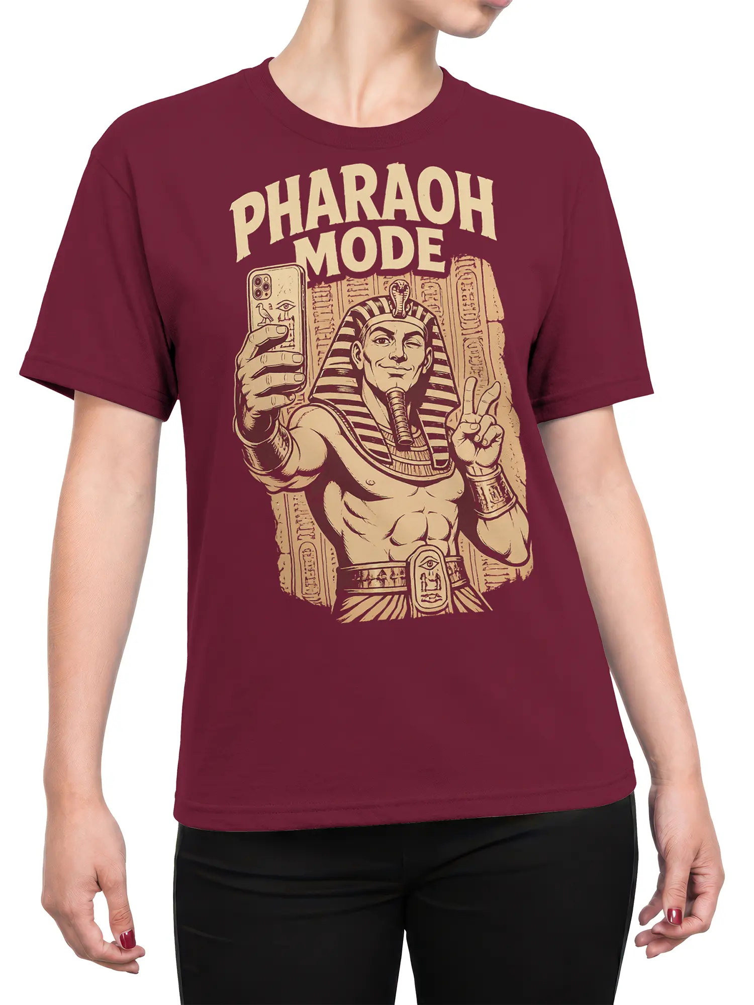 Female torso wearing a burgundy Pharaoh Mode Egyptian graphic T-shirt with cream vintage artwork
