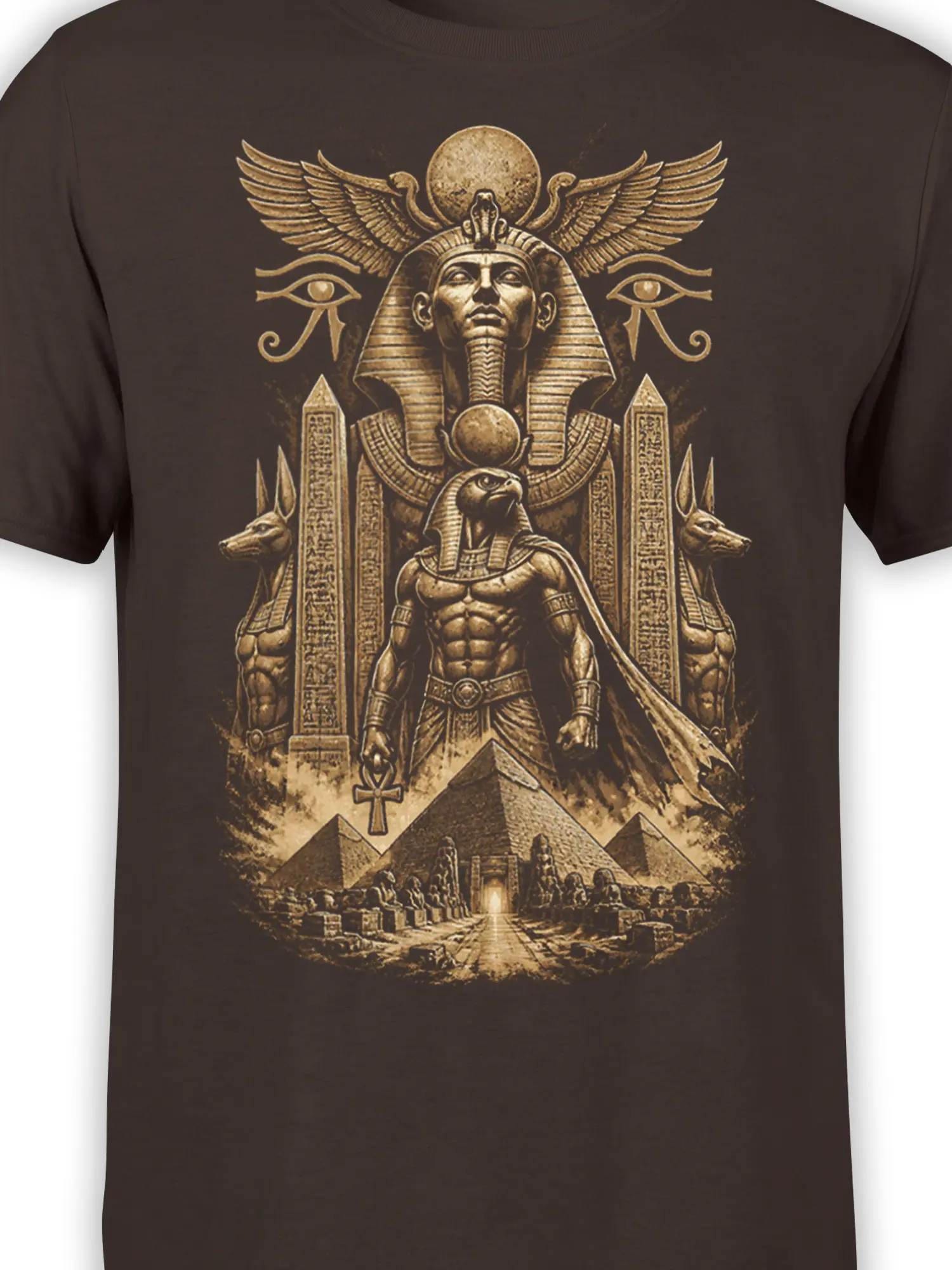 Close-up of Egyptian guardian artwork with falcon figure, winged symbols, pyramids, and carved pillars on brown fabric