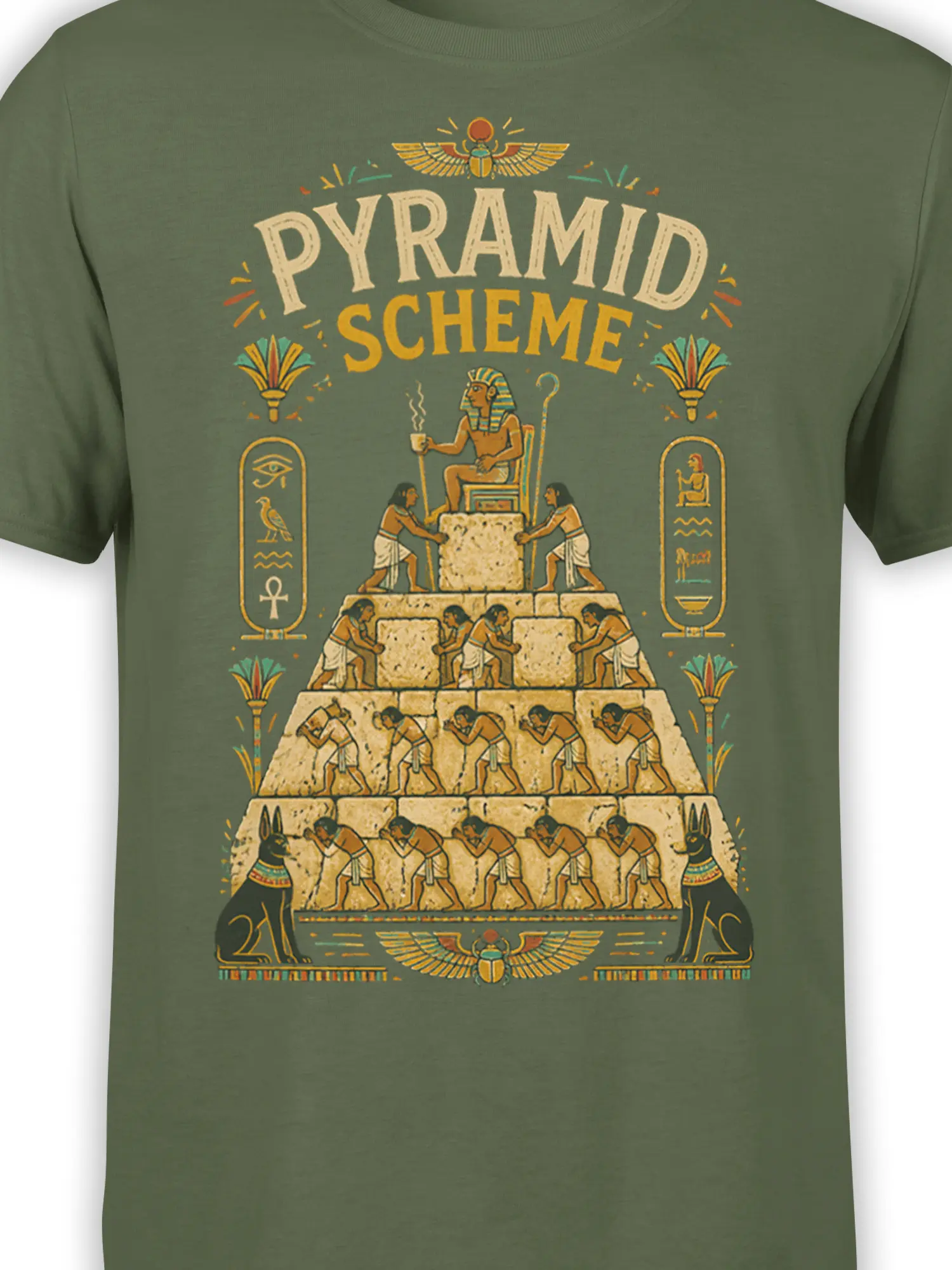 Close-up of Pyramid Scheme text and Egyptian artwork with a pharaoh, pyramid workers, scarab, and symbols