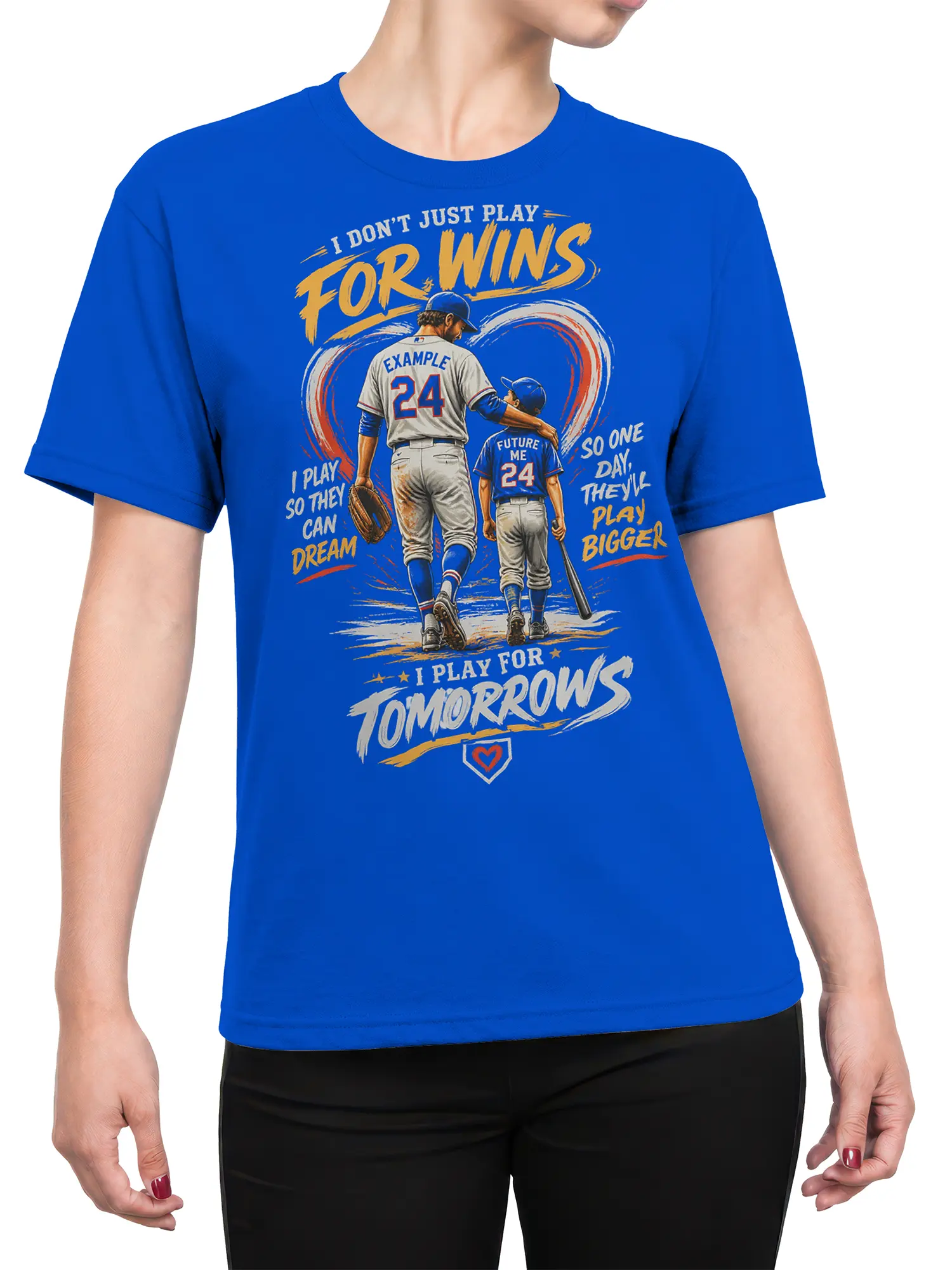 Female torso wearing a blue baseball T-shirt with two players and motivational lettering about dreams, legacy, and tomorrow