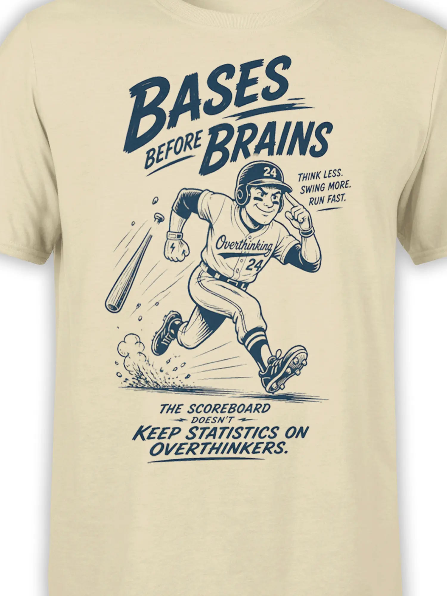 Close-up of retro baseball player graphic and “Bases Before Brains” lettering on beige fabric