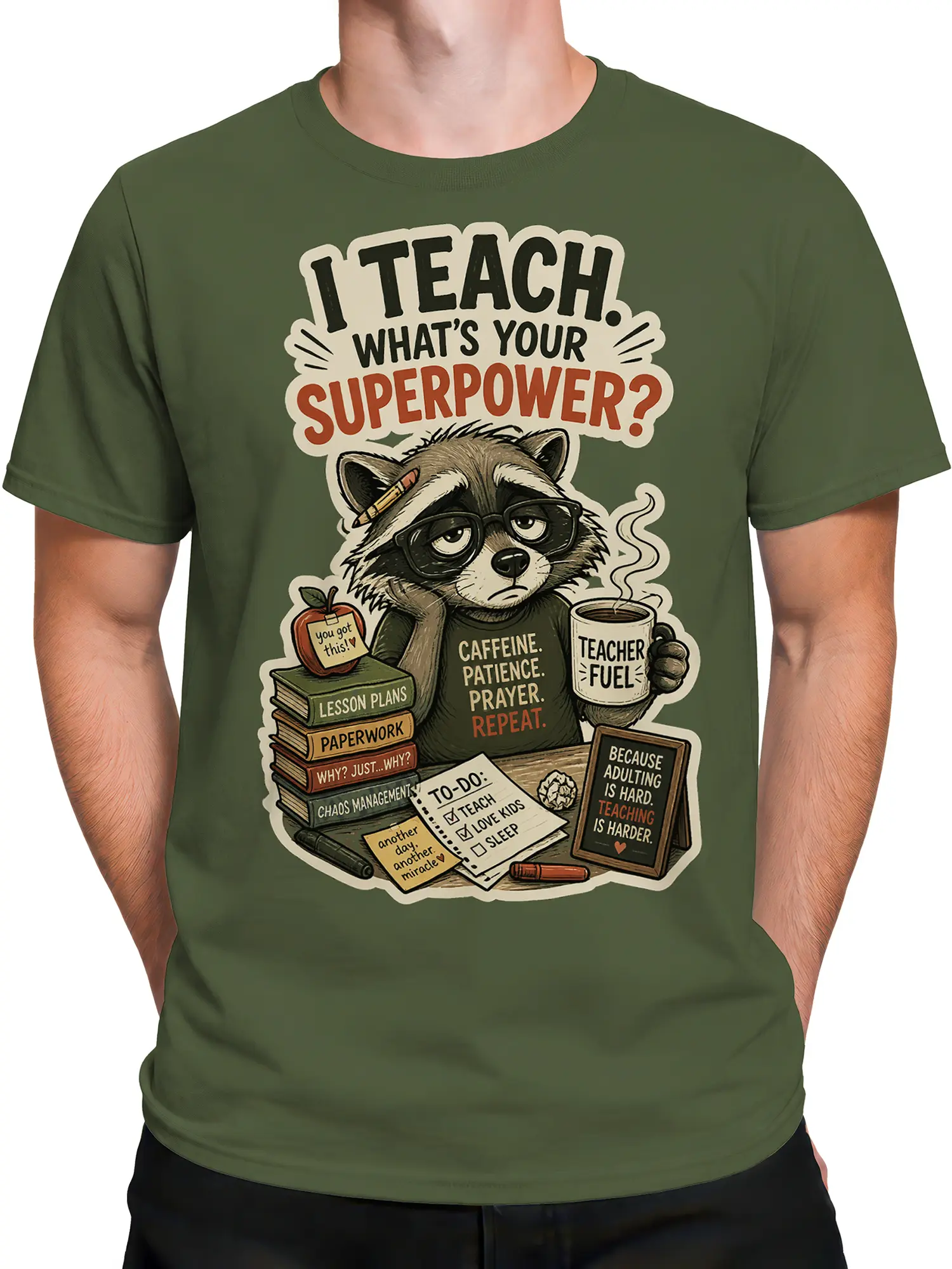 Male torso wearing a green teacher T-shirt with sleepy raccoon, books, apple, coffee, and school details