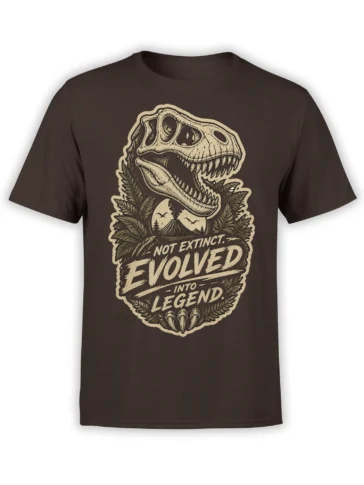 Brown dinosaur t-shirt with a fossil skull, volcanic jungle scene, and “Not Extinct. Evolved Into Legend.” text