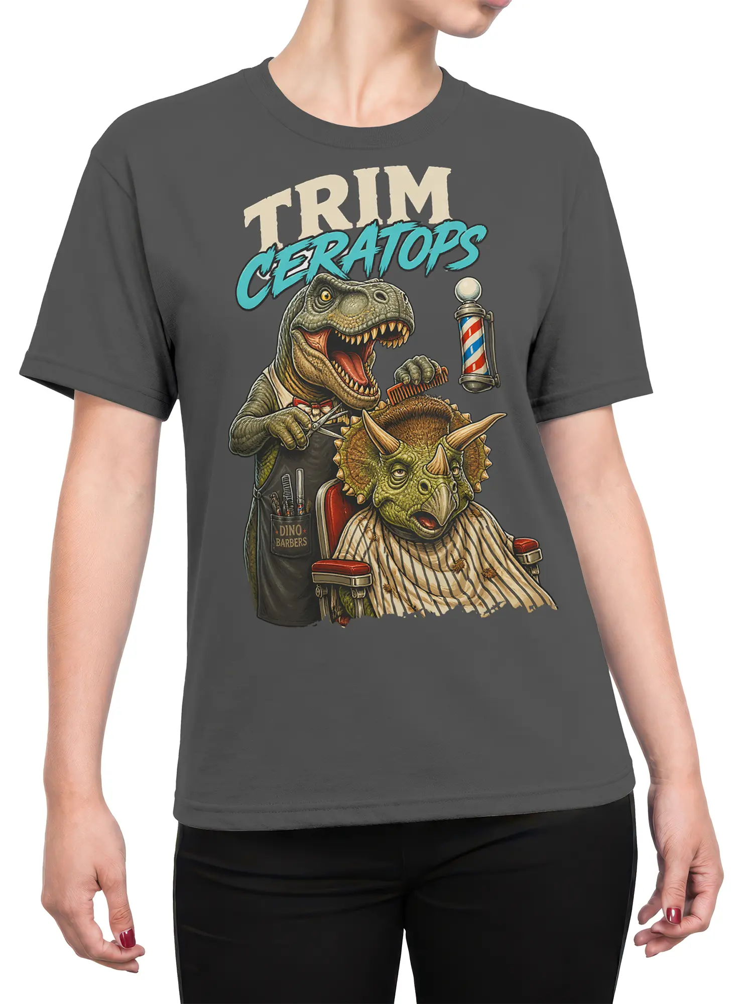 Female torso wearing a gray dinosaur barber T-shirt with a T-Rex, triceratops, and vintage lettering