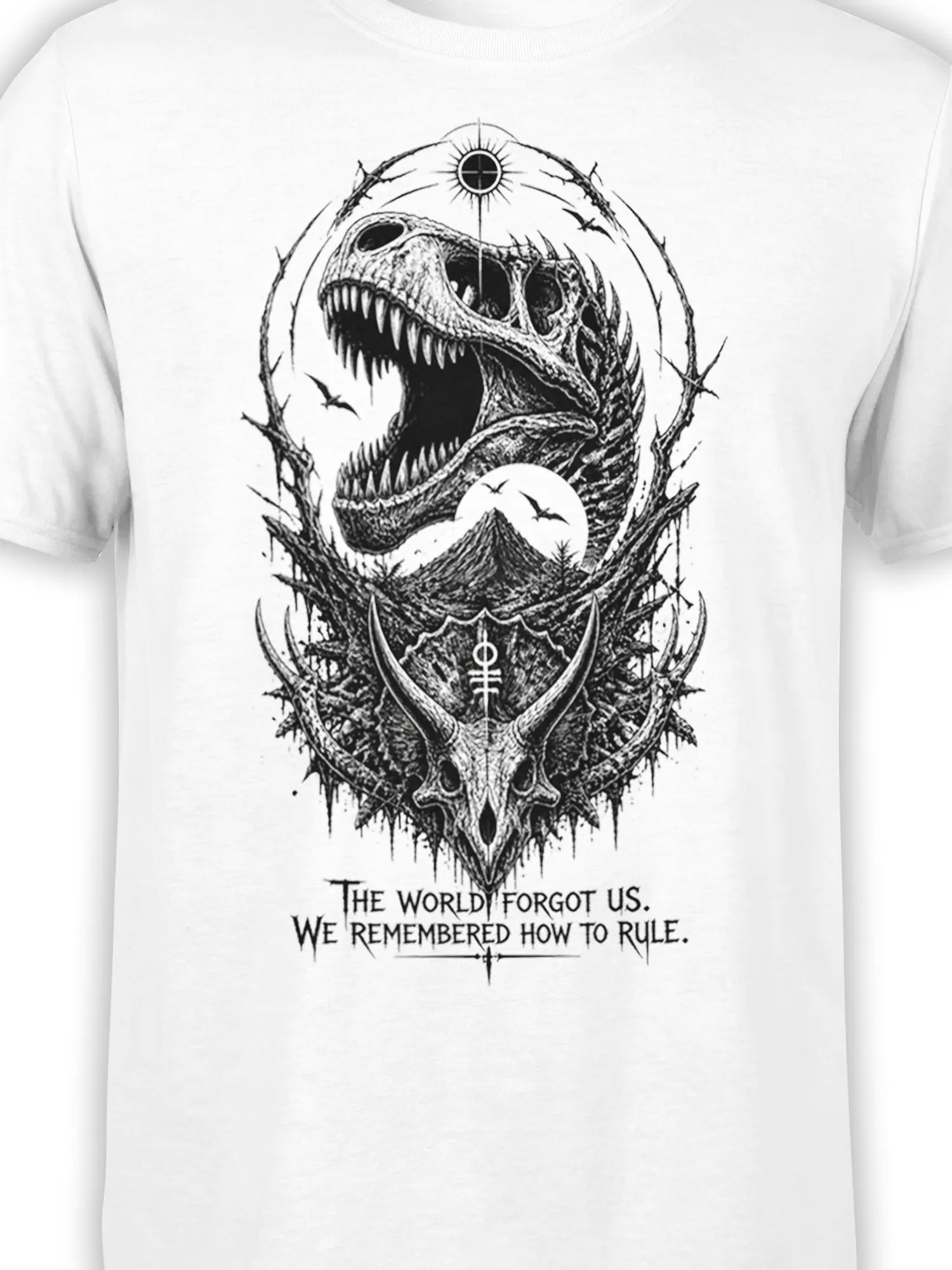 Close-up of roaring dinosaur skull and horned skull artwork printed in black on a white T-shirt