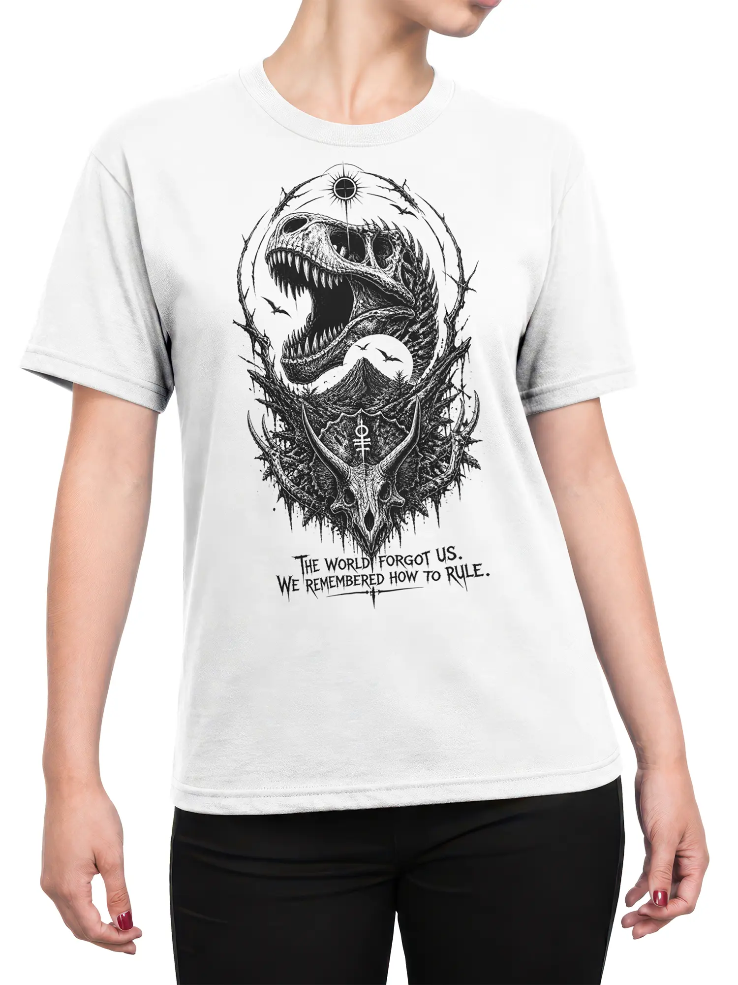 Female torso wearing a white dinosaur T-shirt with roaring prehistoric artwork and moonlit skull details