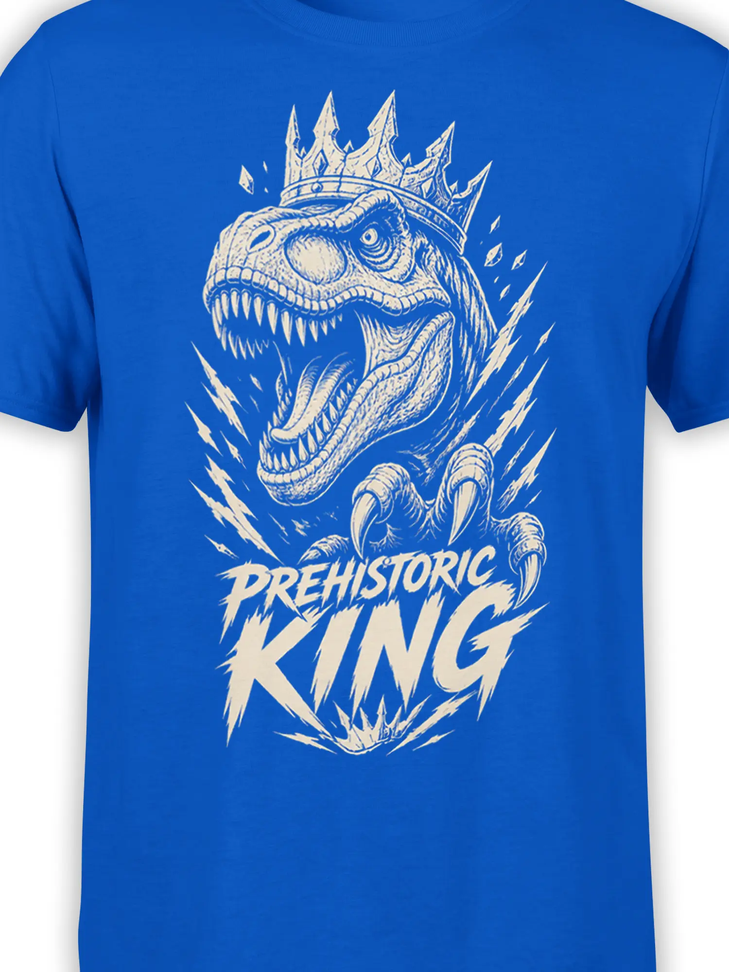 Close-up of crowned Tyrannosaurus rex artwork and cream lettering on a blue dinosaur T-shirt