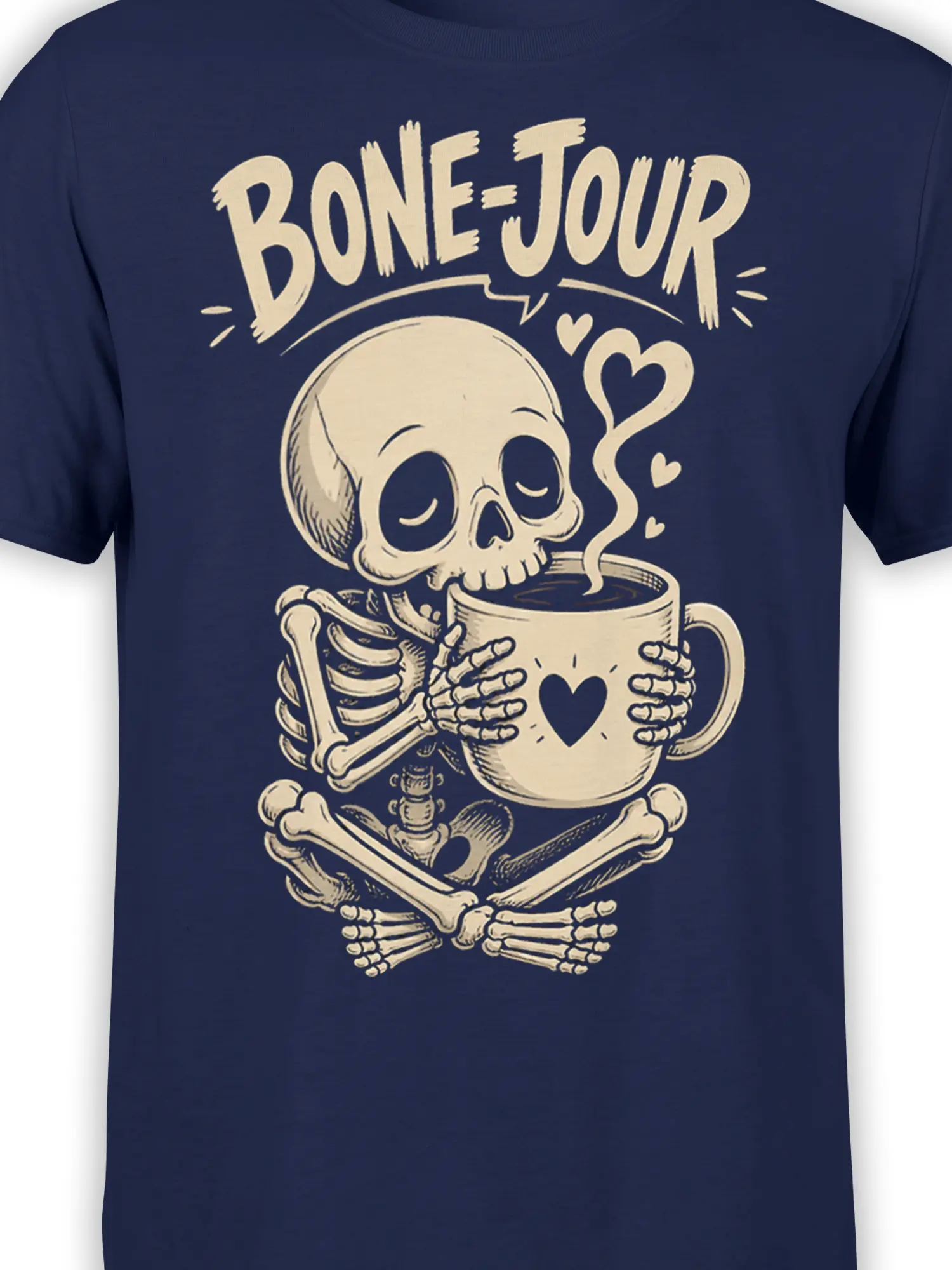 Close-up of skeleton coffee design with heart mug, rising steam, crossed bones, and cream artwork on navy