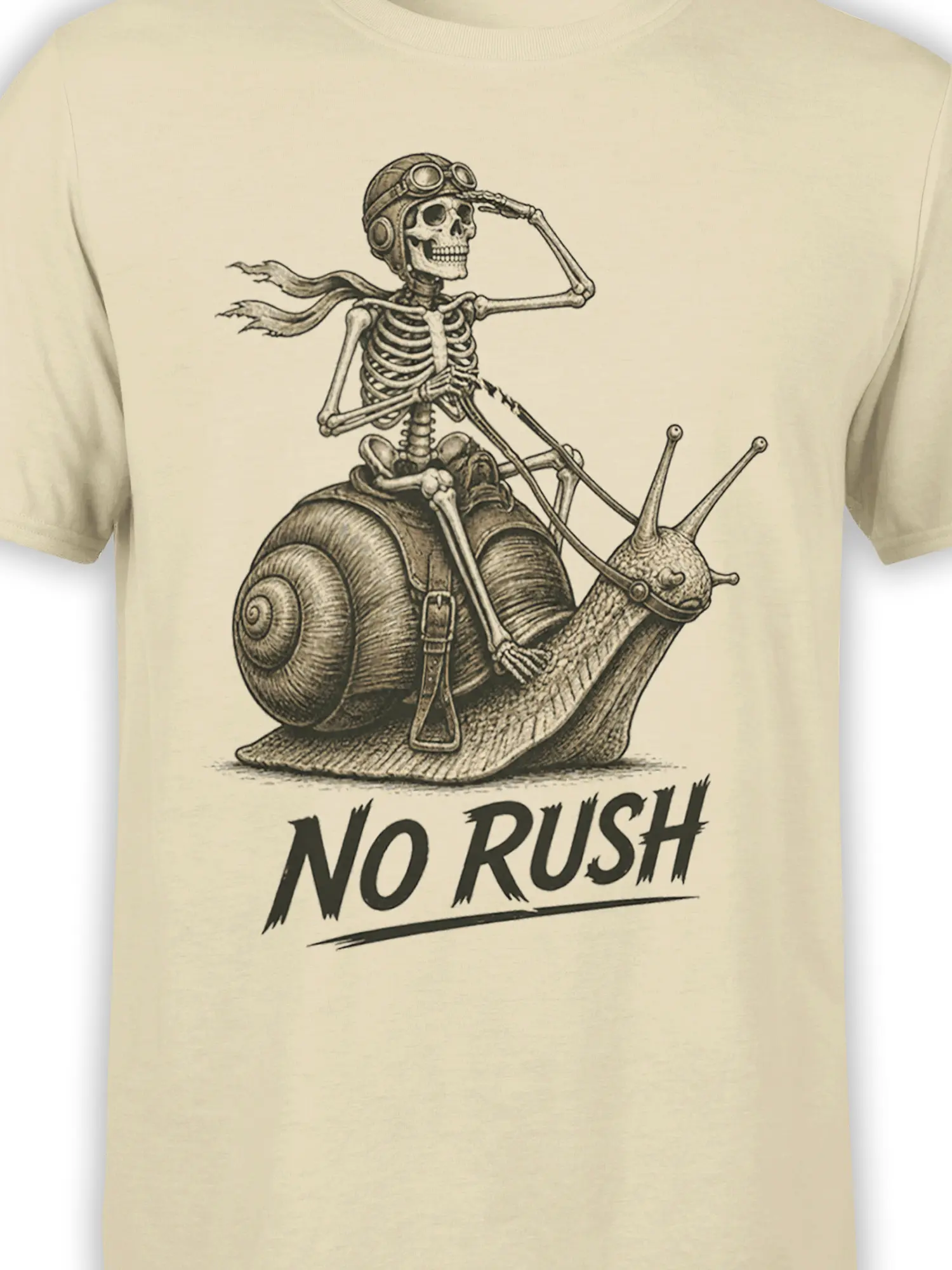 Close-up of the skeleton snail artwork, goggles, scarf, shell, and "NO RUSH" text on beige fabric