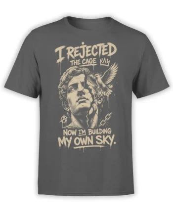Gray freedom T-shirt with distressed human face, flying bird, broken chain, and “Building My Own Sky” lettering