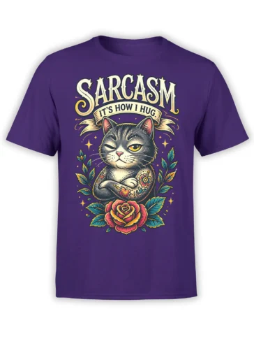 Purple T-shirt with a winking tattooed gray cat, roses, floral branches, and “Sarcasm” banner artwork
