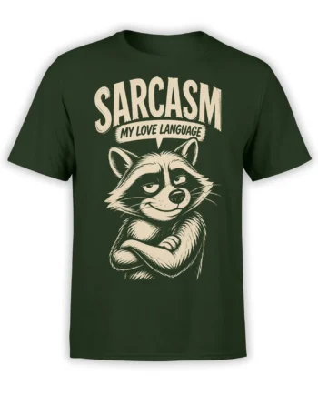 Dark green raccoon T-shirt with crossed arms, a sly smile, and cream “Sarcasm My Love Language” lettering