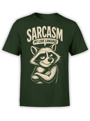 Dark green raccoon T-shirt with crossed arms, a sly smile, and cream “Sarcasm My Love Language” lettering